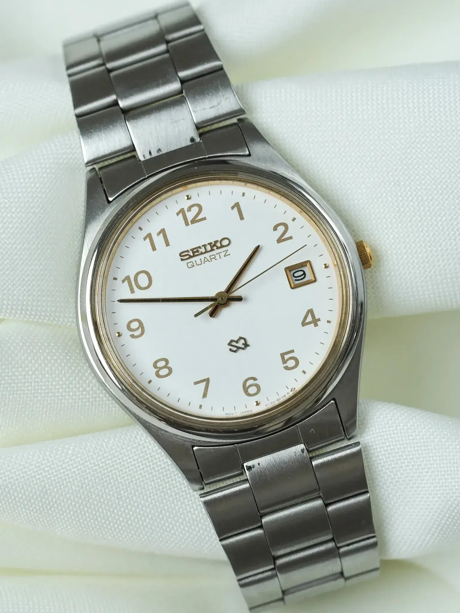 Seiko - SQ Redondo Acero Oro números arábigos fecha - 1988