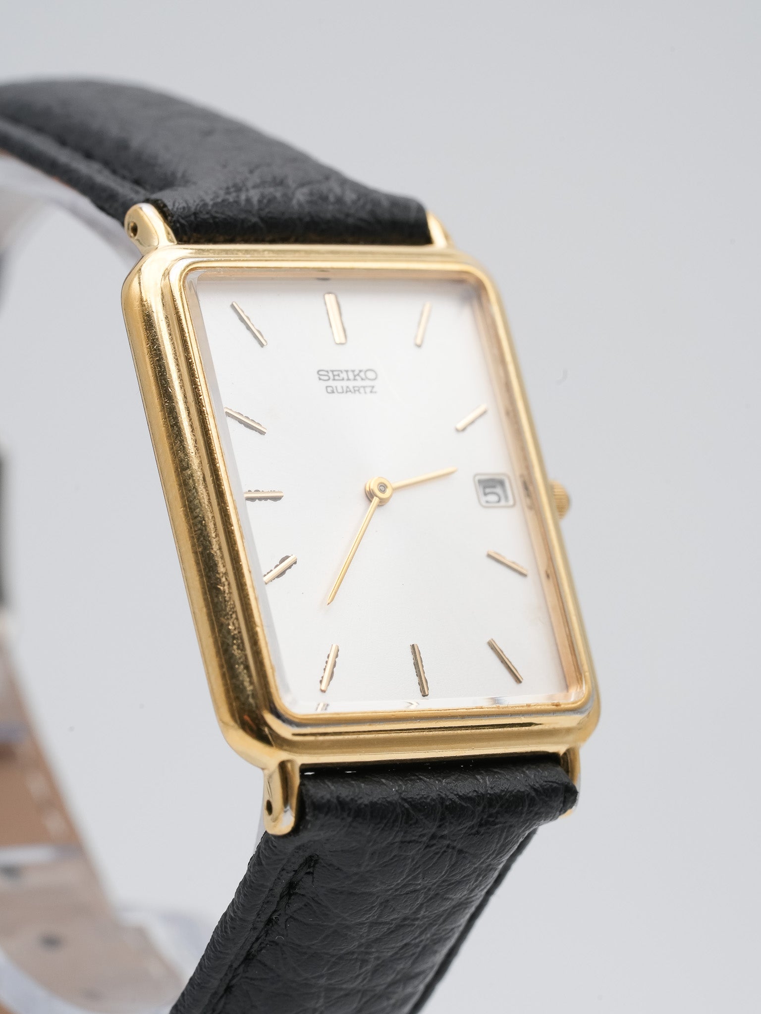 Seiko - Tank Allongée plaqué or date cabochon - 2002 - Atelier Victor - Vintage Shop