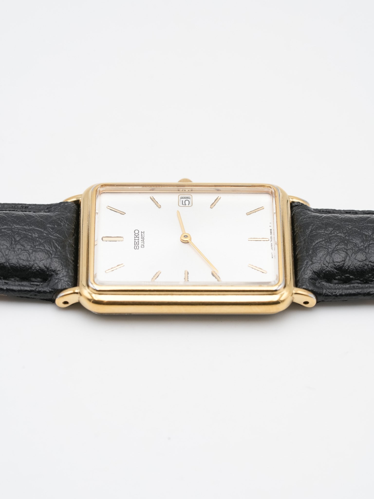 Seiko - Tank Allongée plaqué or date cabochon - 2002 - Atelier Victor - Vintage Shop