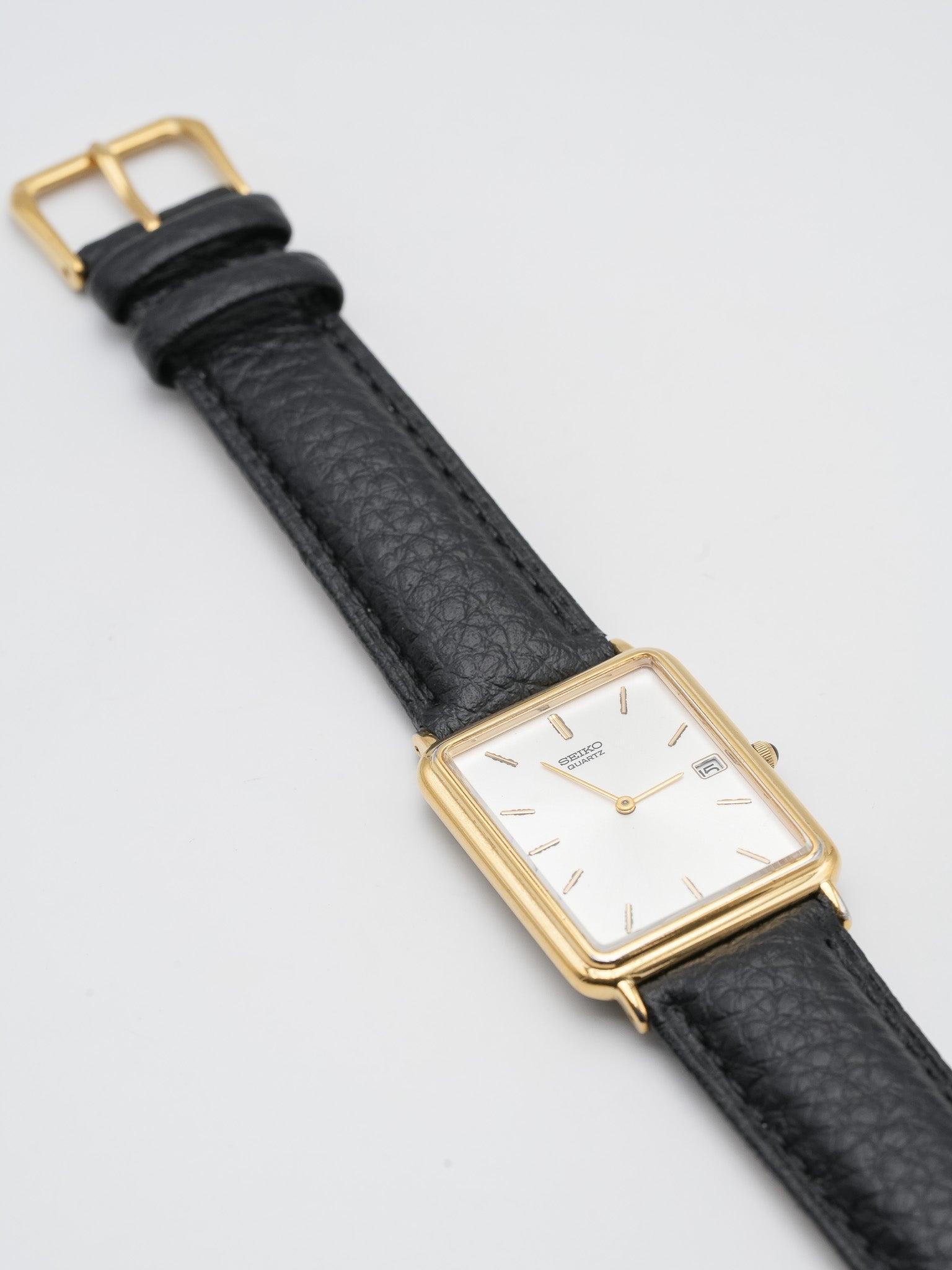 Seiko - Tank Allongée plaqué or date cabochon - 2002 - Atelier Victor - Vintage Shop