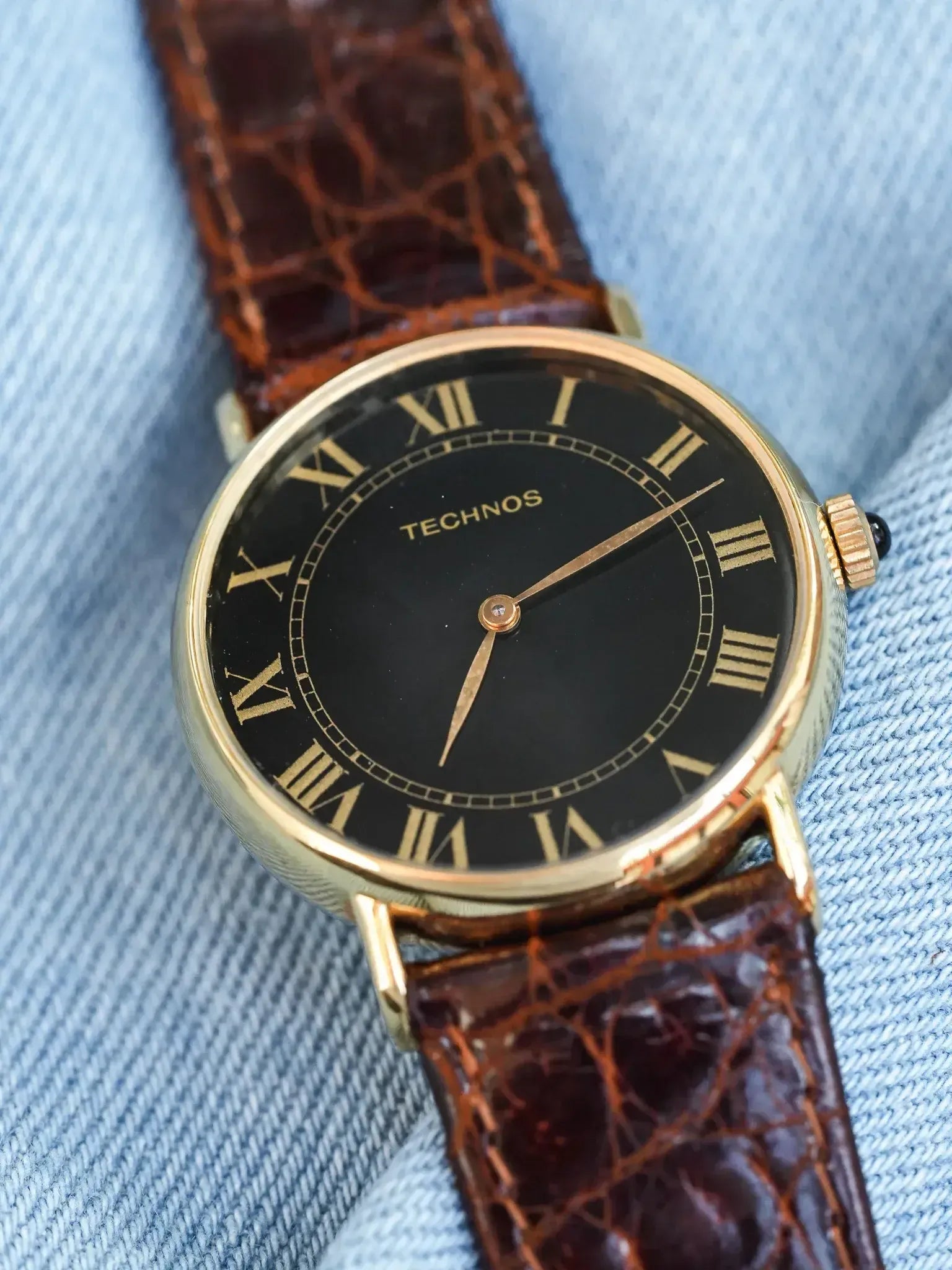 Technos - plaqué or noir romain or - 1980s - Atelier Victor