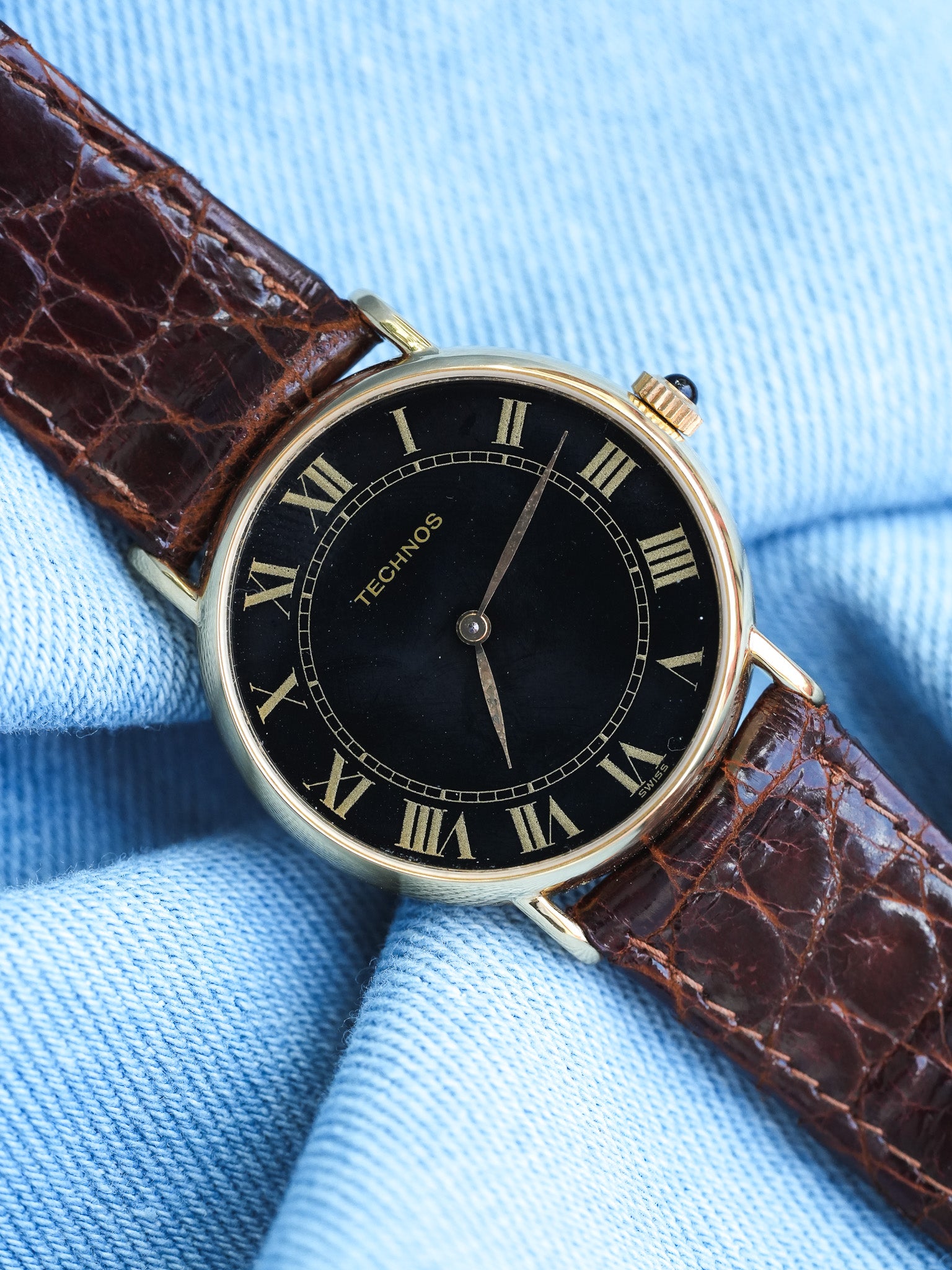 Technos - plaqué or noir romain or - 1980s - Atelier Victor - Vintage Shop