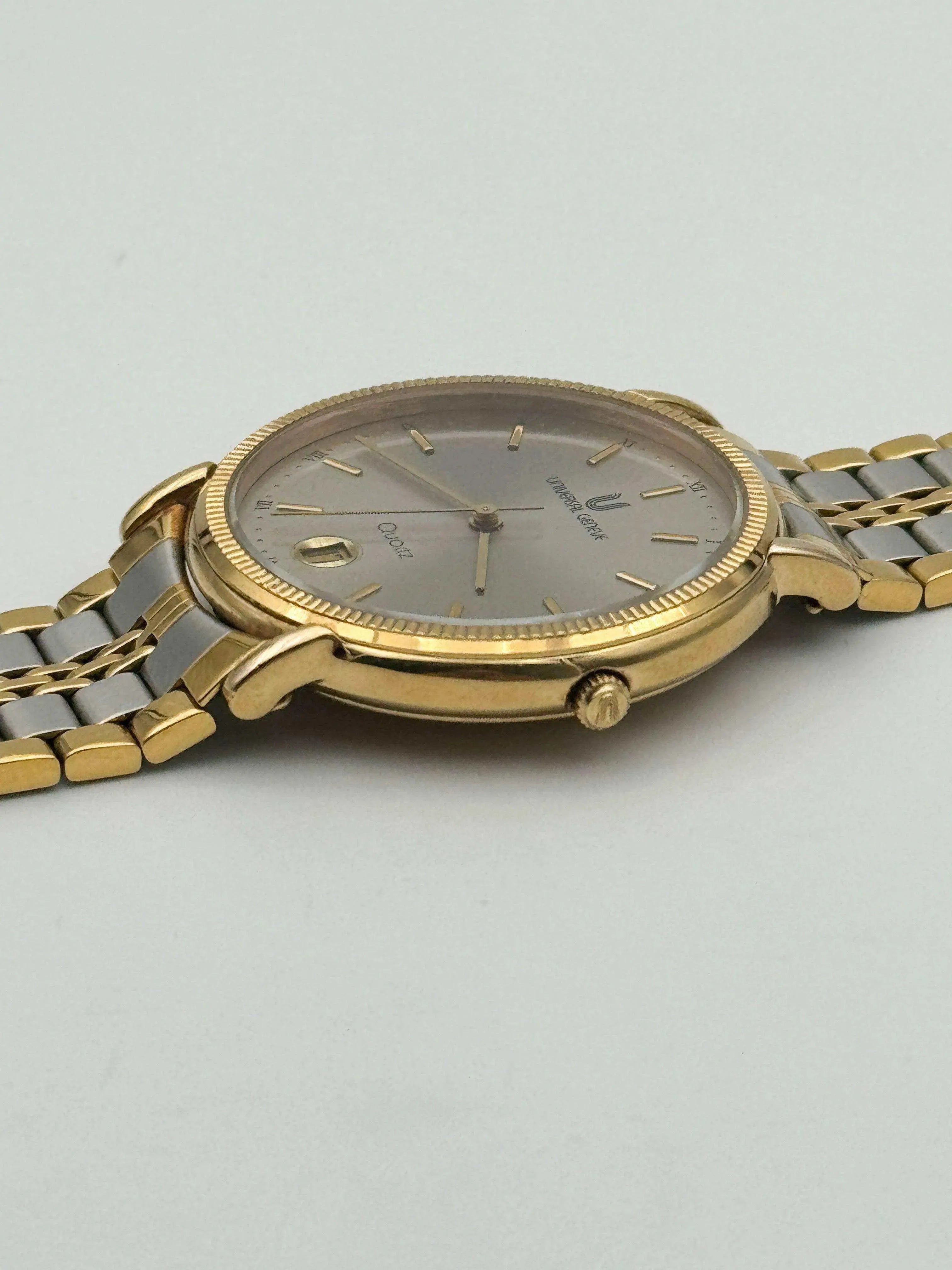 Universal Genève - Circle Steel & Gold Cannelé - 1980’s - Atelier Victor Paris - Vintage Watch Shop Dubai