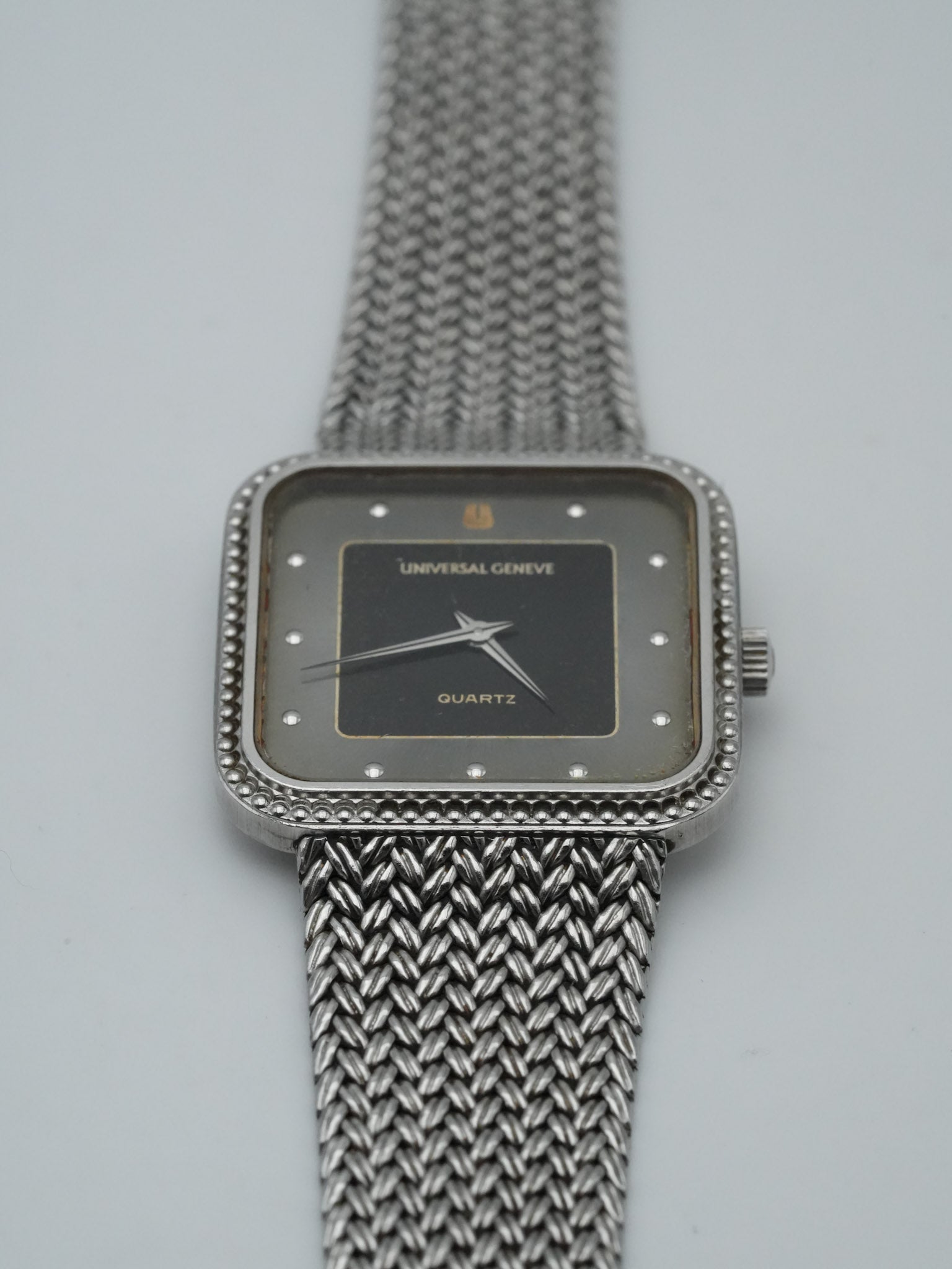 Universal Genève - Maille Acier Cadran Noir Patiné - 1980s - Atelier Victor - Vintage Shop