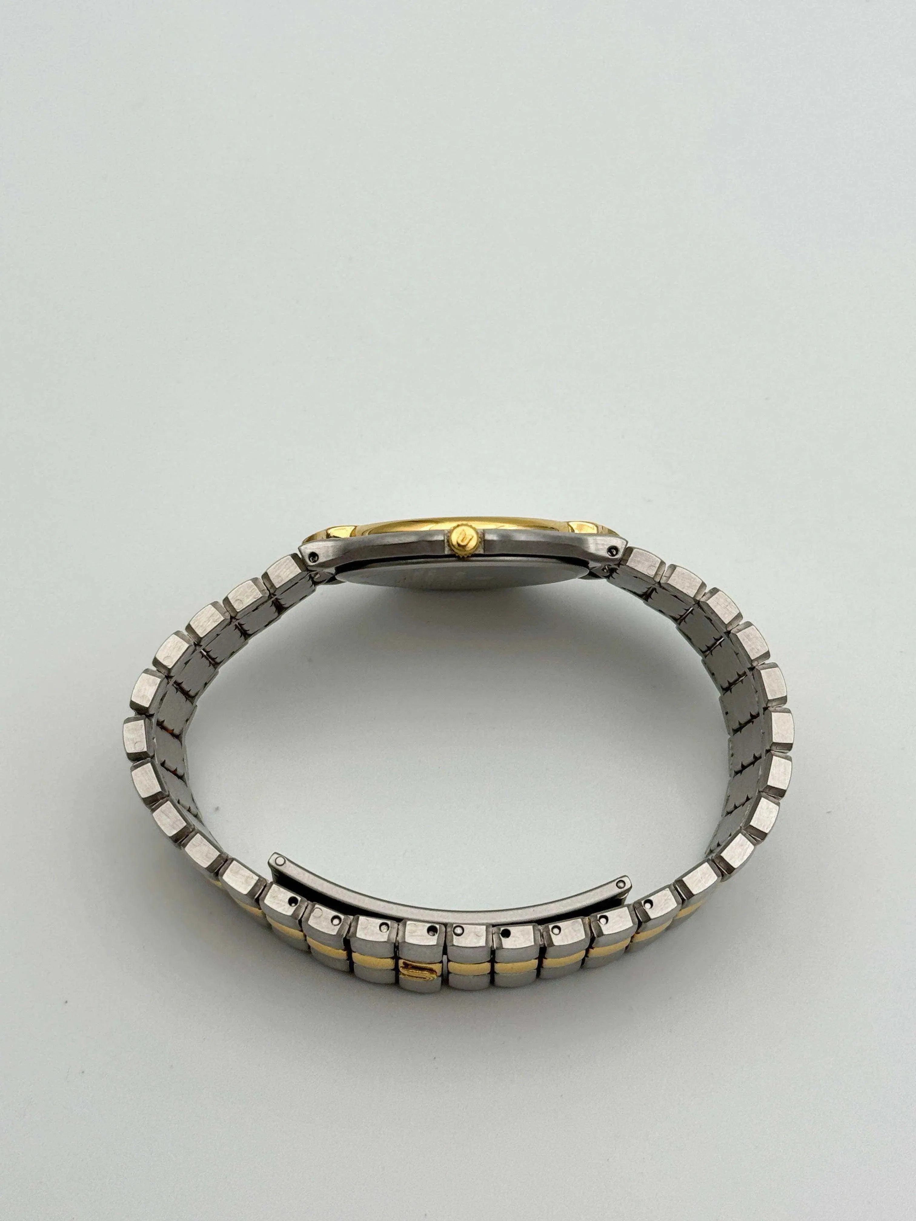 Universal Genève - Polerouter Gold & Steal Quartz - 1980s - Atelier Victor Paris - Vintage Watch Shop Dubai
