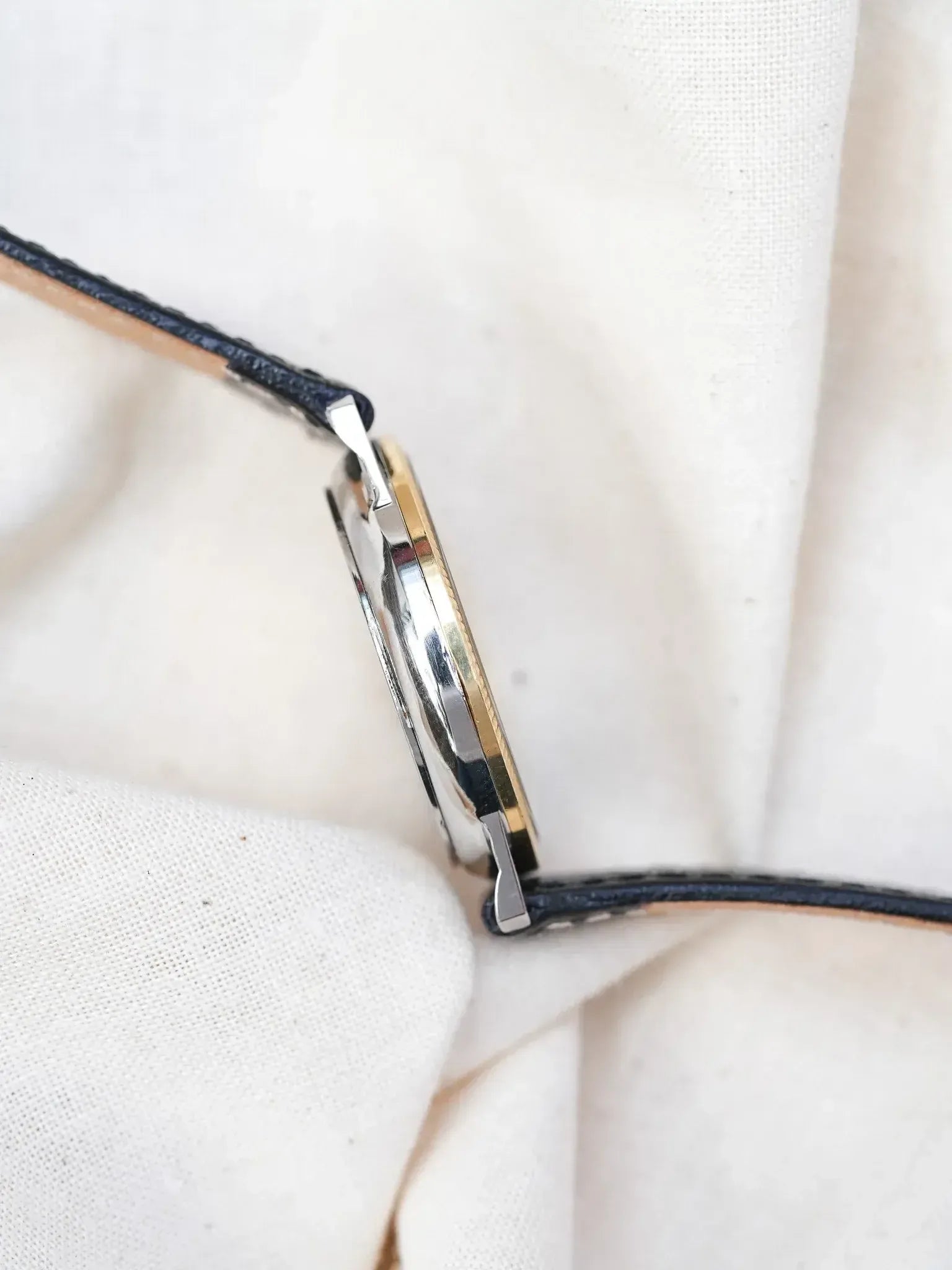 Universal Genève - Triple Calendar Phase de lune acier lunette guillochée or 18k - 1990s - Atelier Victor