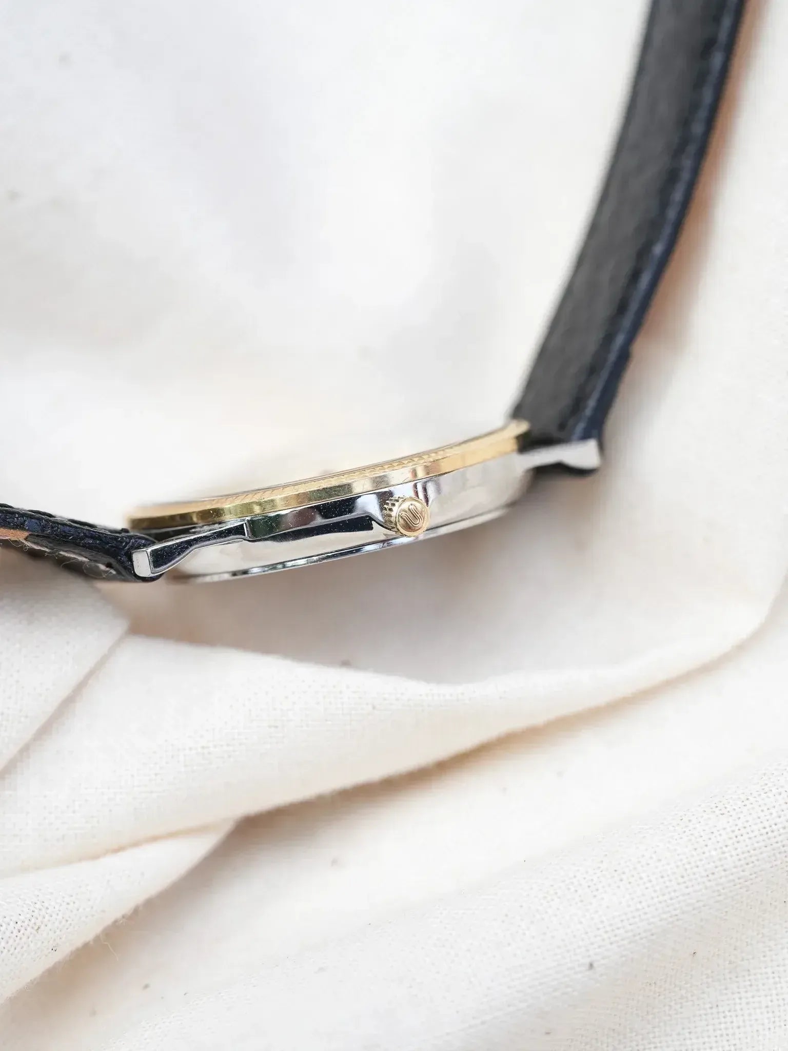 Universal Genève - Triple Calendar Phase de lune acier lunette guillochée or 18k - 1990s - Atelier Victor