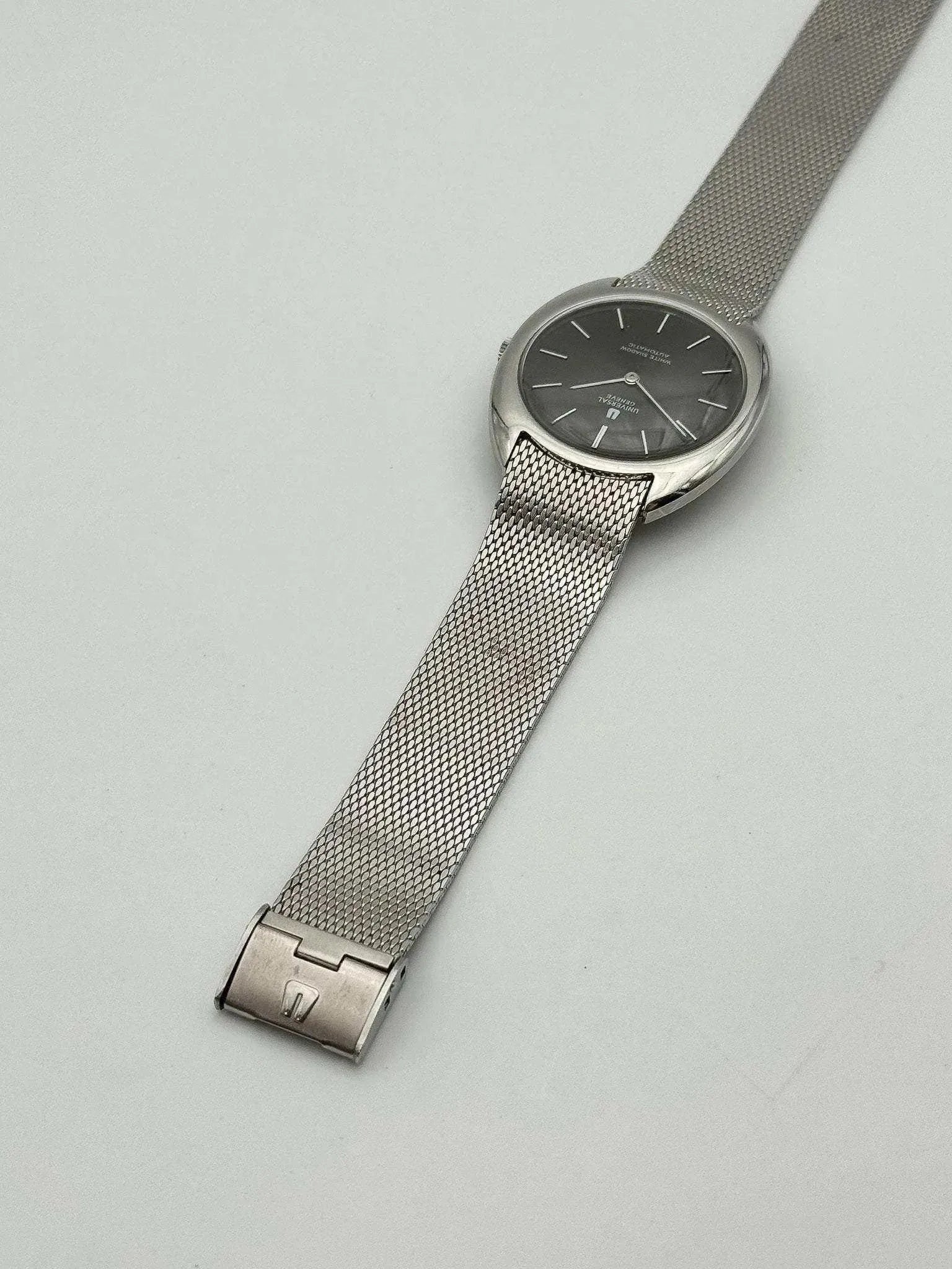Universal Genève - White Shadow Black Full Steel - 1960s - Atelier Victor - Vintage Shop