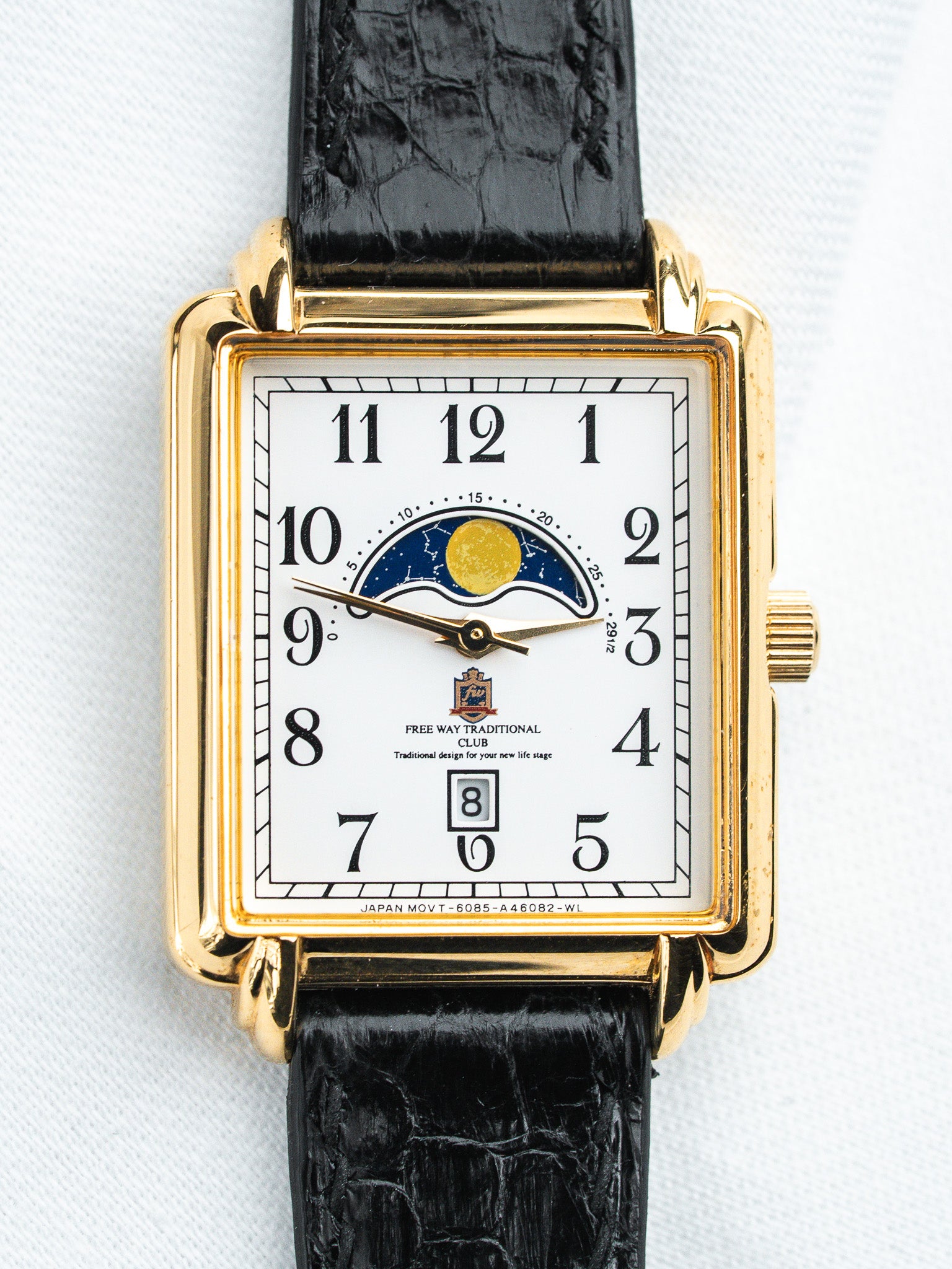Free Way Traditional Club vintage watch with gold case, white dial, moon phase, black alligator strap