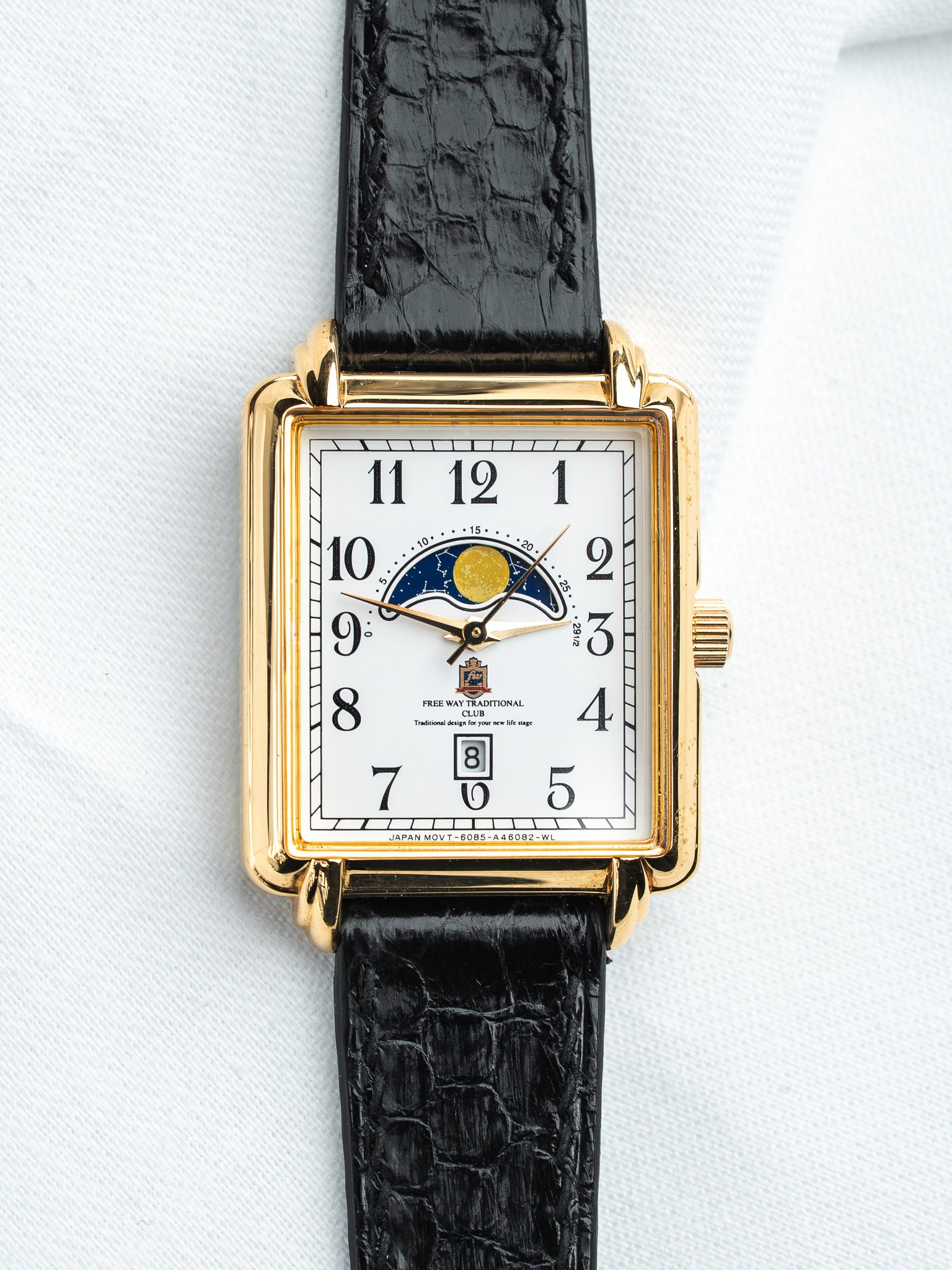 Vintage Free Way Traditional Club watch with gold case, white dial, moon phase, black crocodile strap