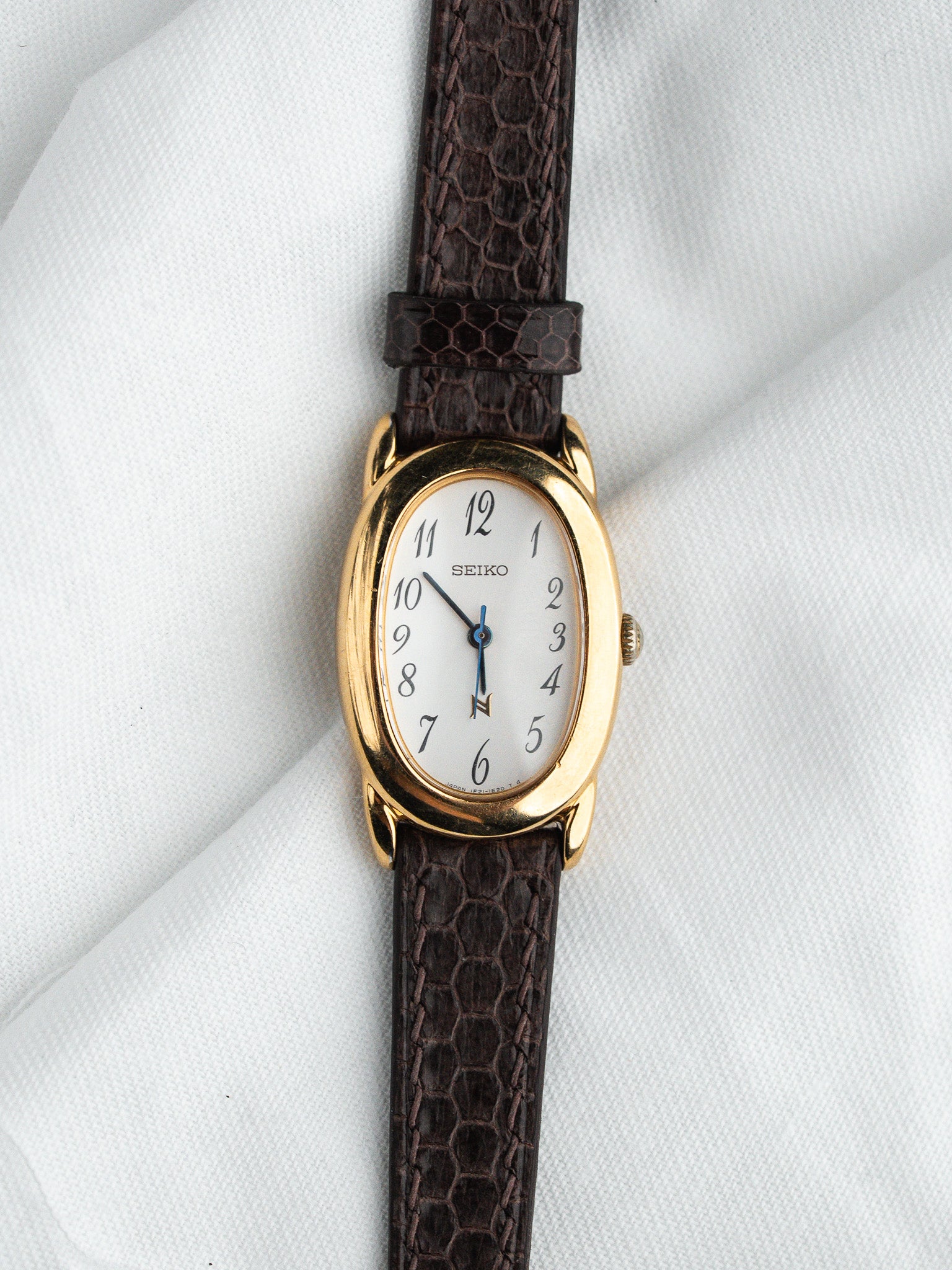 Seiko Noie 1F21-5B70 Baignoire Plaqué Or — Cadran Blanc Arabe (1994)