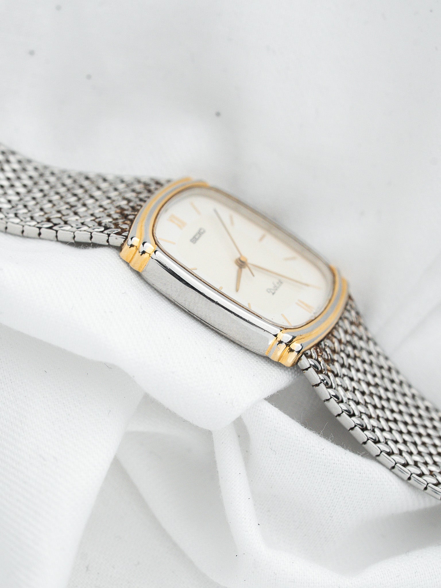 ساعة Seiko فينتاج Dolce 7741-5110 — ثنائية اللون شبكية (1990) 