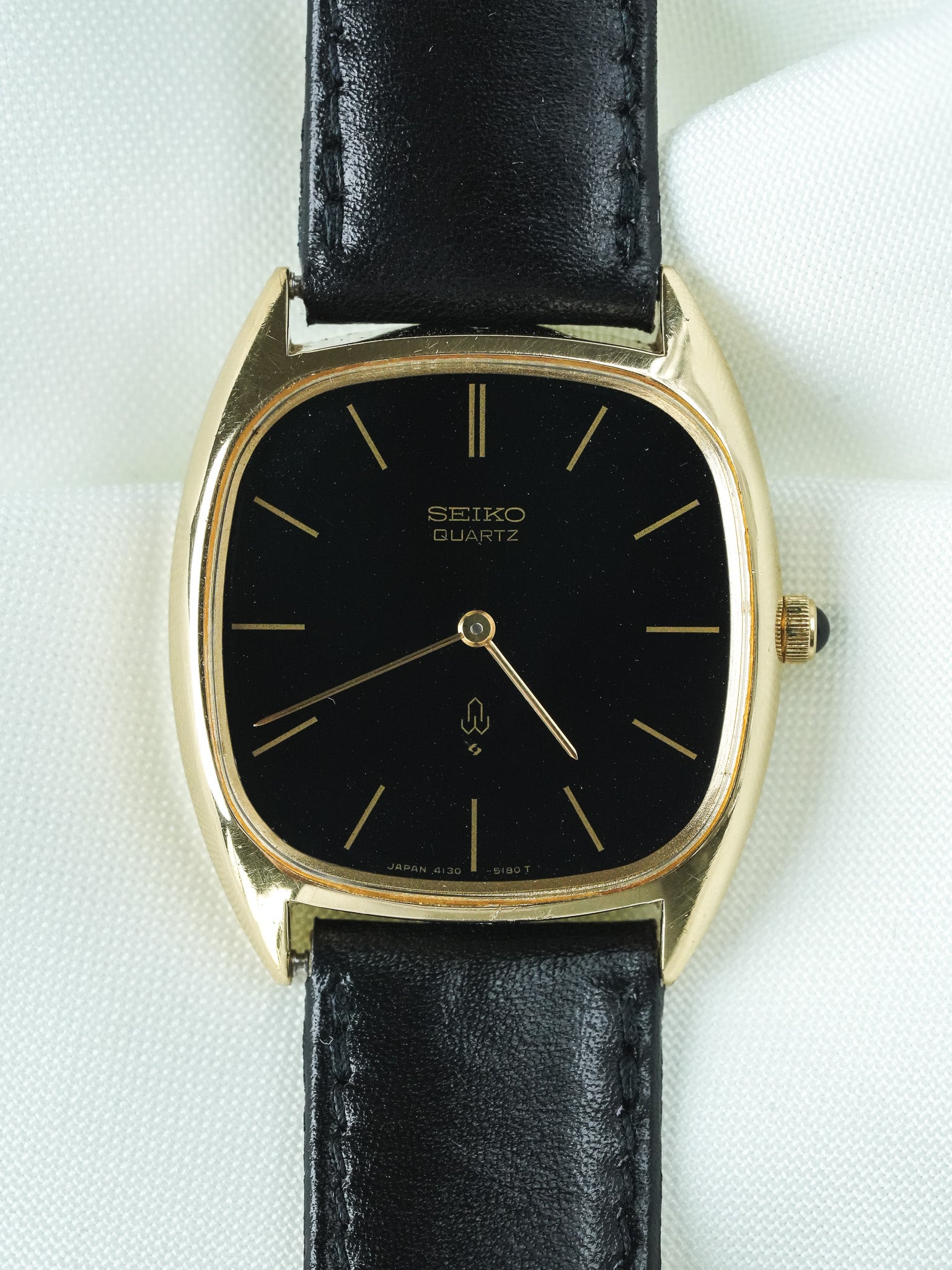Montre Seiko Vintage - Tonneau Or Cadran Noir Étoilé (1977)