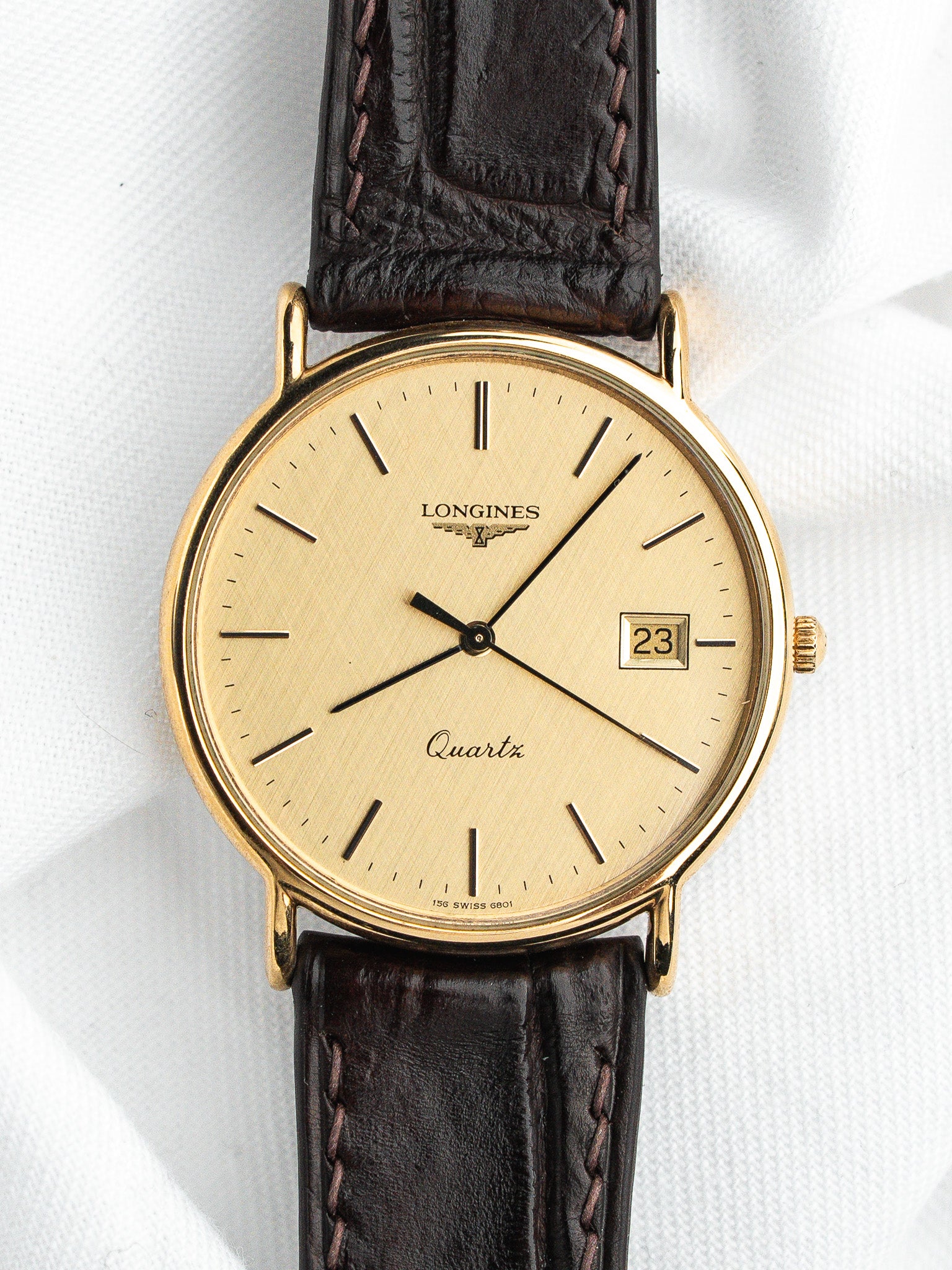 Longines Quartz Plaquée Or — Cadran Doré Tapissé Date (1980s)