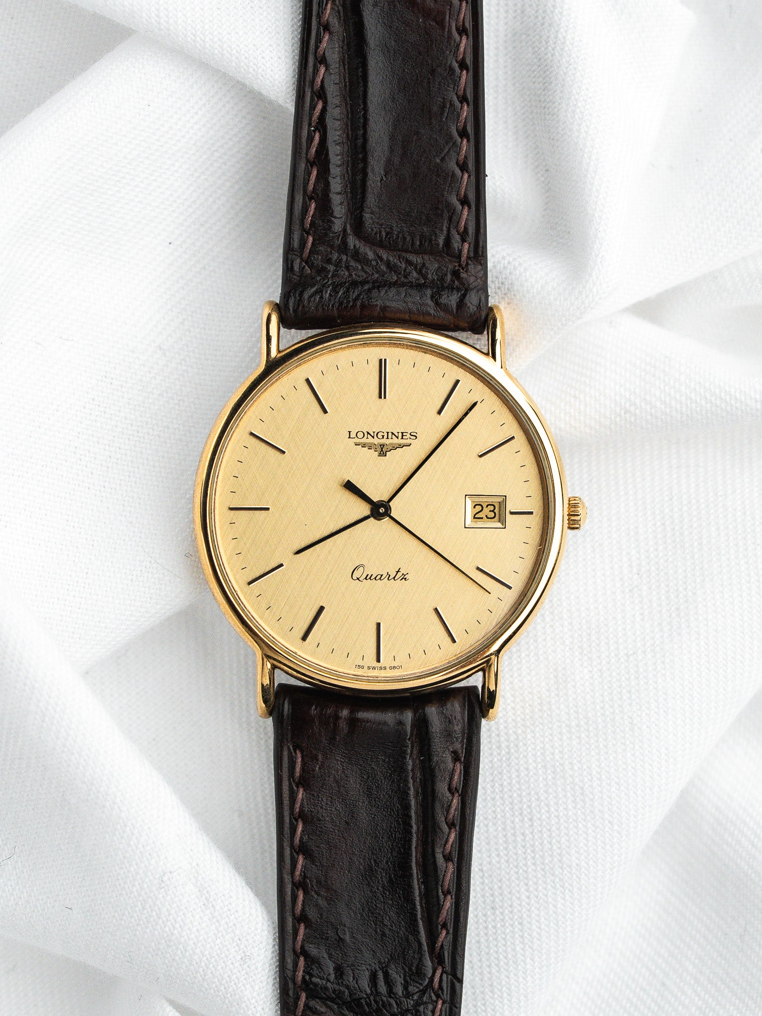 Longines Quartz Plaquée Or — Cadran Doré Tapissé Date (1980s)