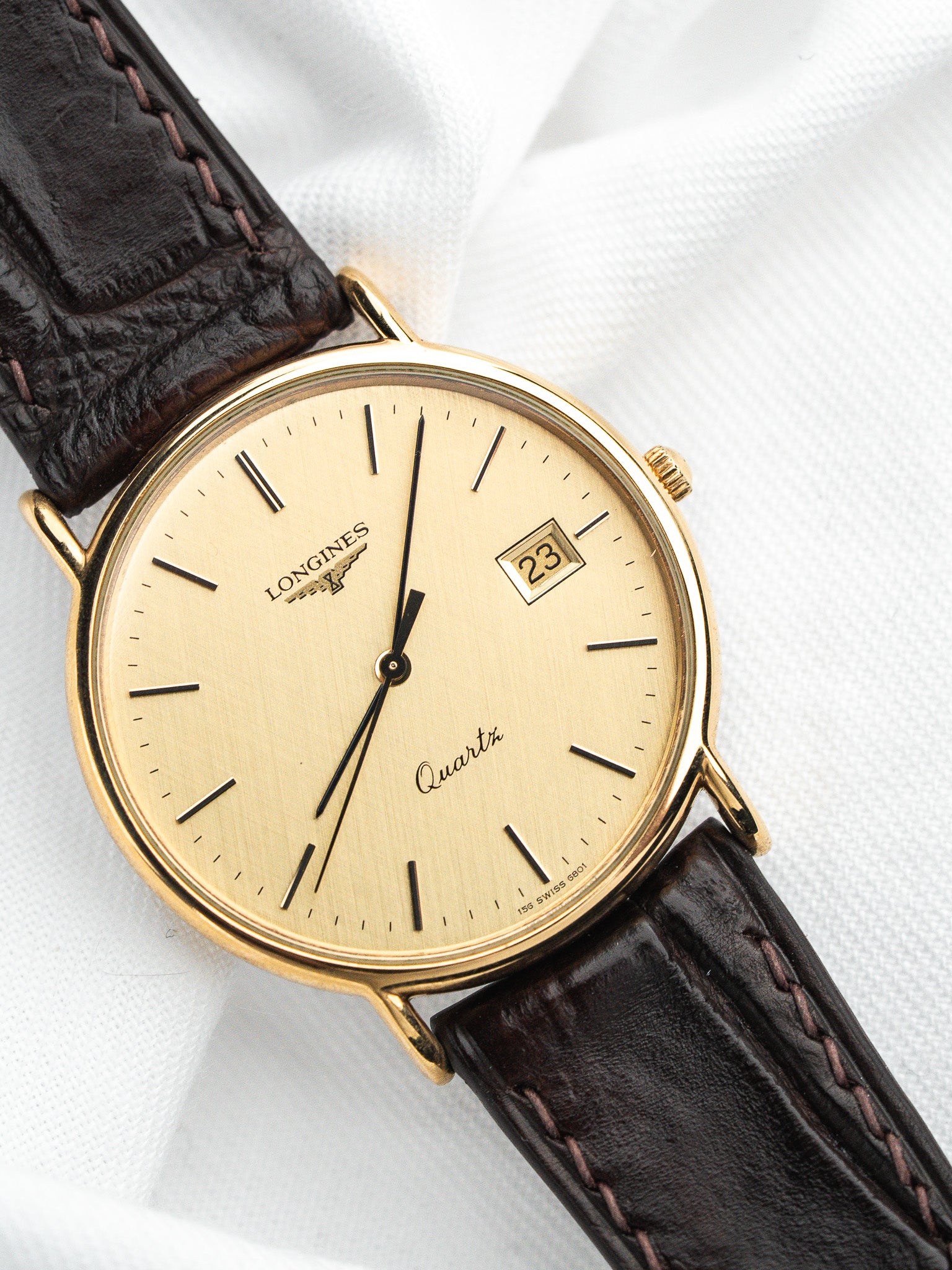 Longines Quartz Plaquée Or — Cadran Doré Tapissé Date (1980s)