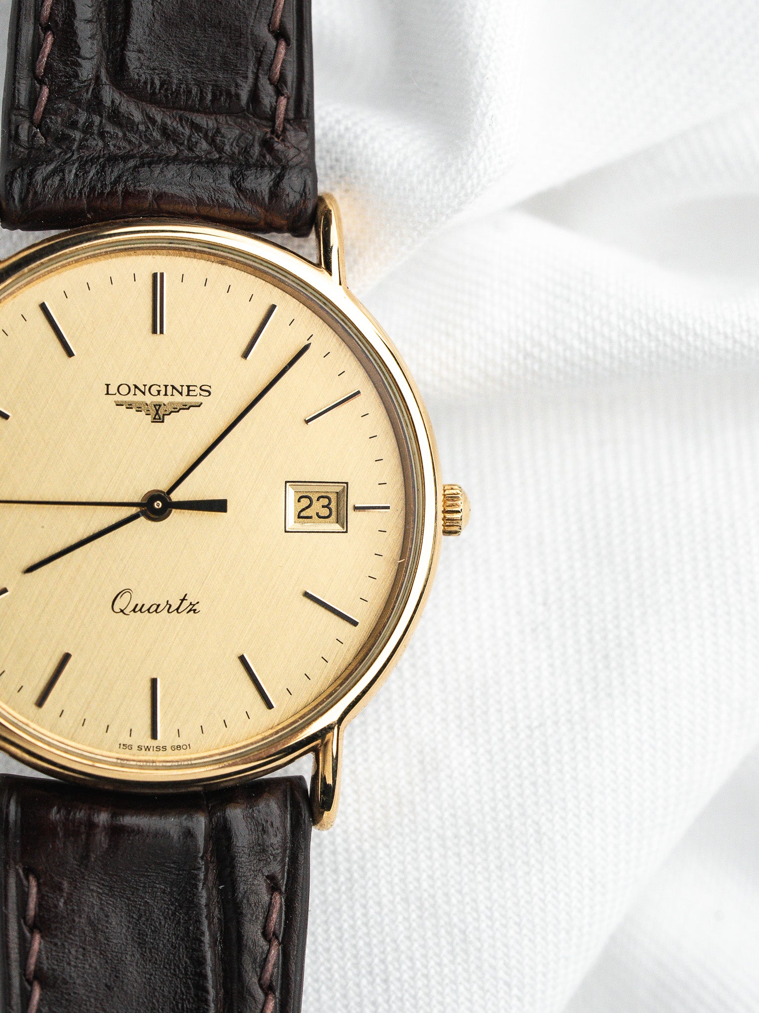 Longines Quartz Plaquée Or — Cadran Doré Tapissé Date (1980s)