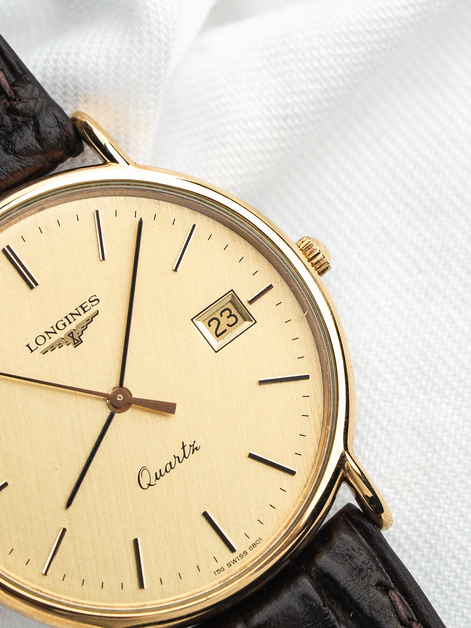 Longines Quartz Plaquée Or — Cadran Doré Tapissé Date (1980s)