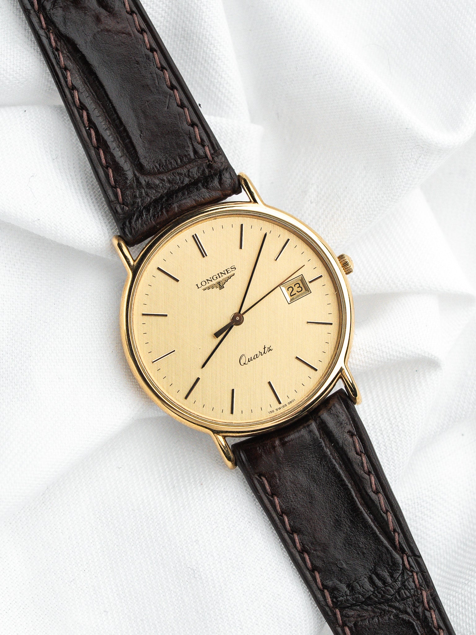 Longines Quartz Plaquée Or — Cadran Doré Tapissé Date (1980s)