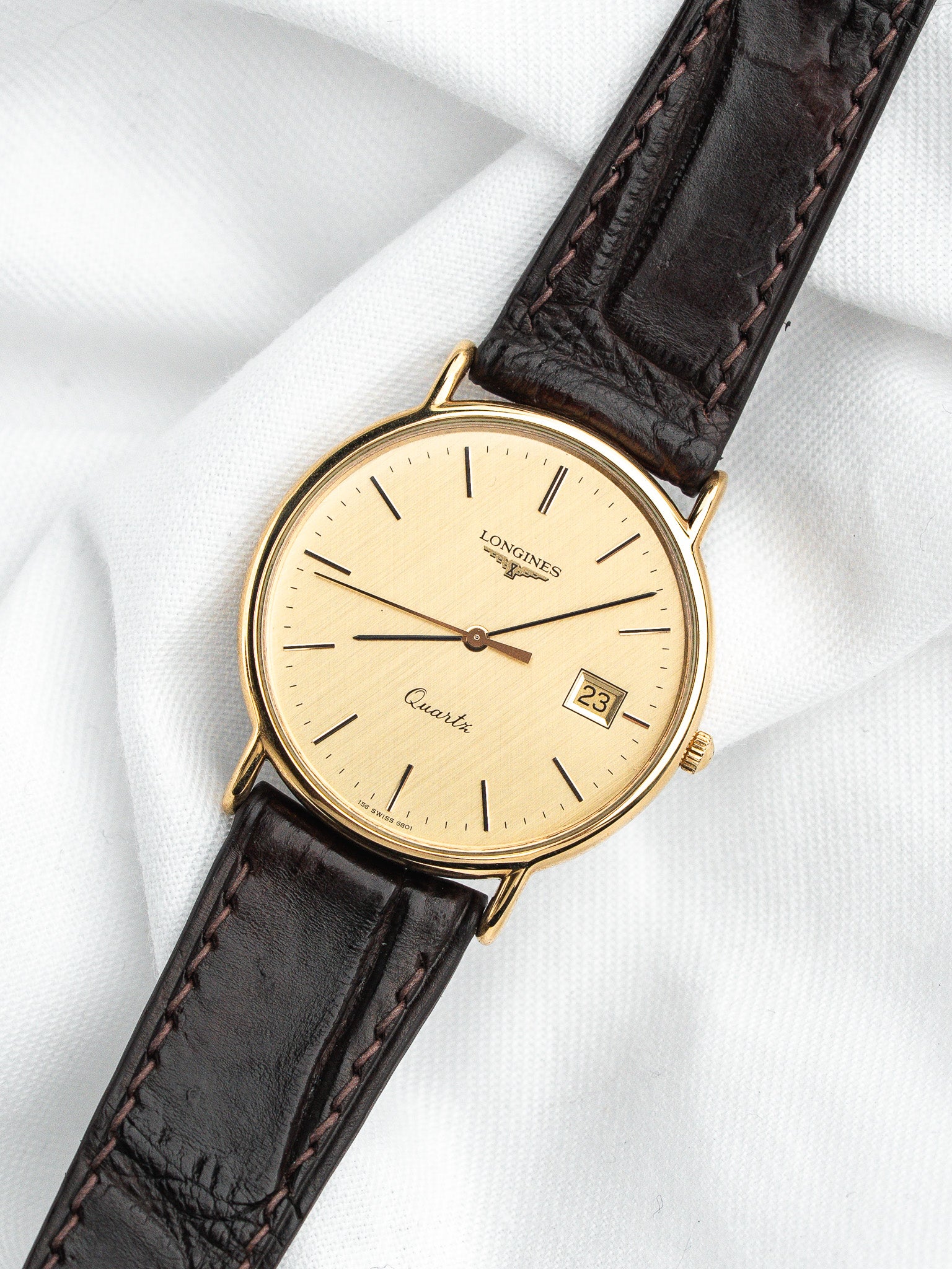 Longines Quartz Plaquée Or — Cadran Doré Tapissé Date (1980s)