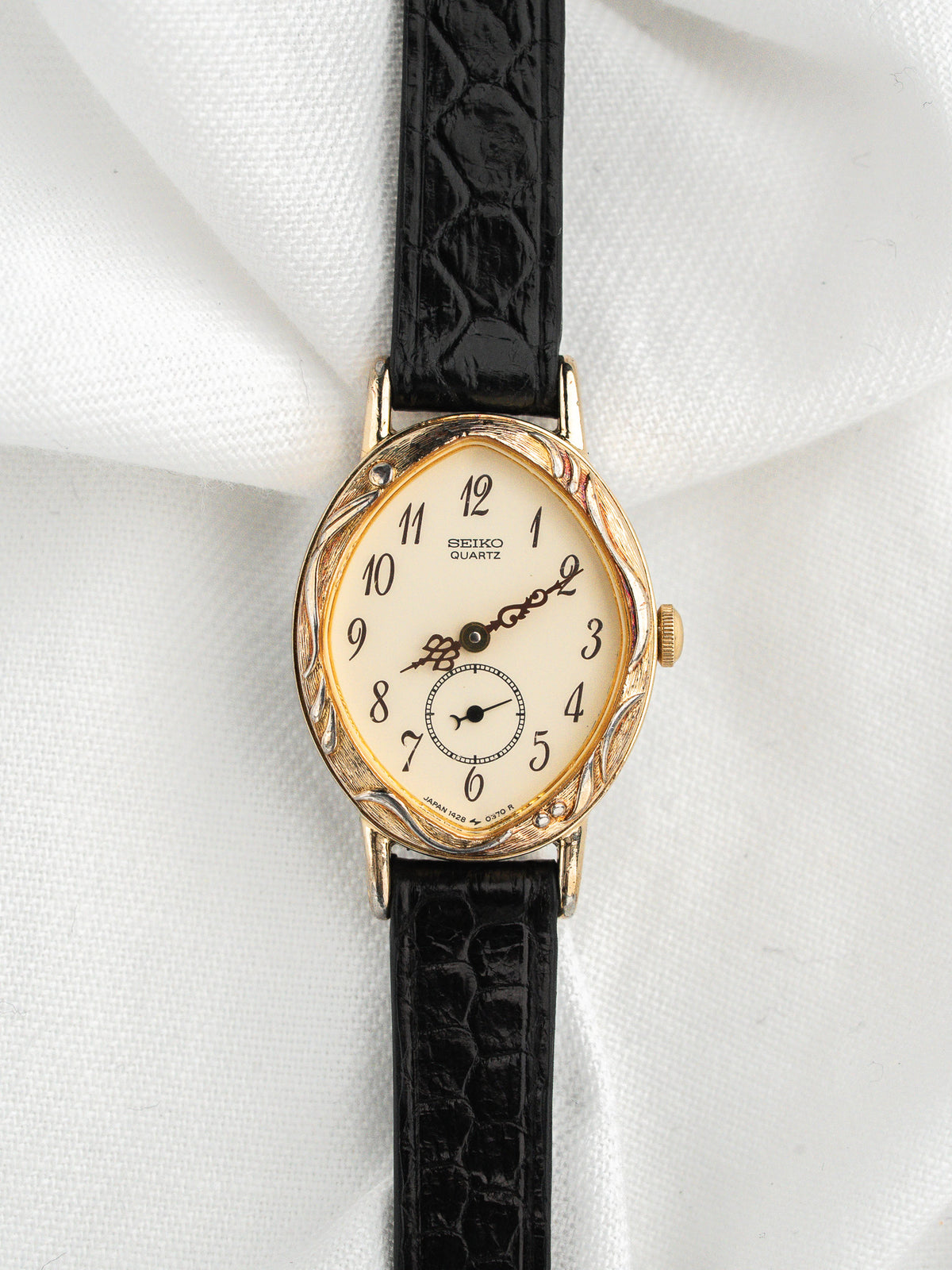 Montre Seiko Vintage 1428-5110 — Ovale, Lunette Feuillages (1983)