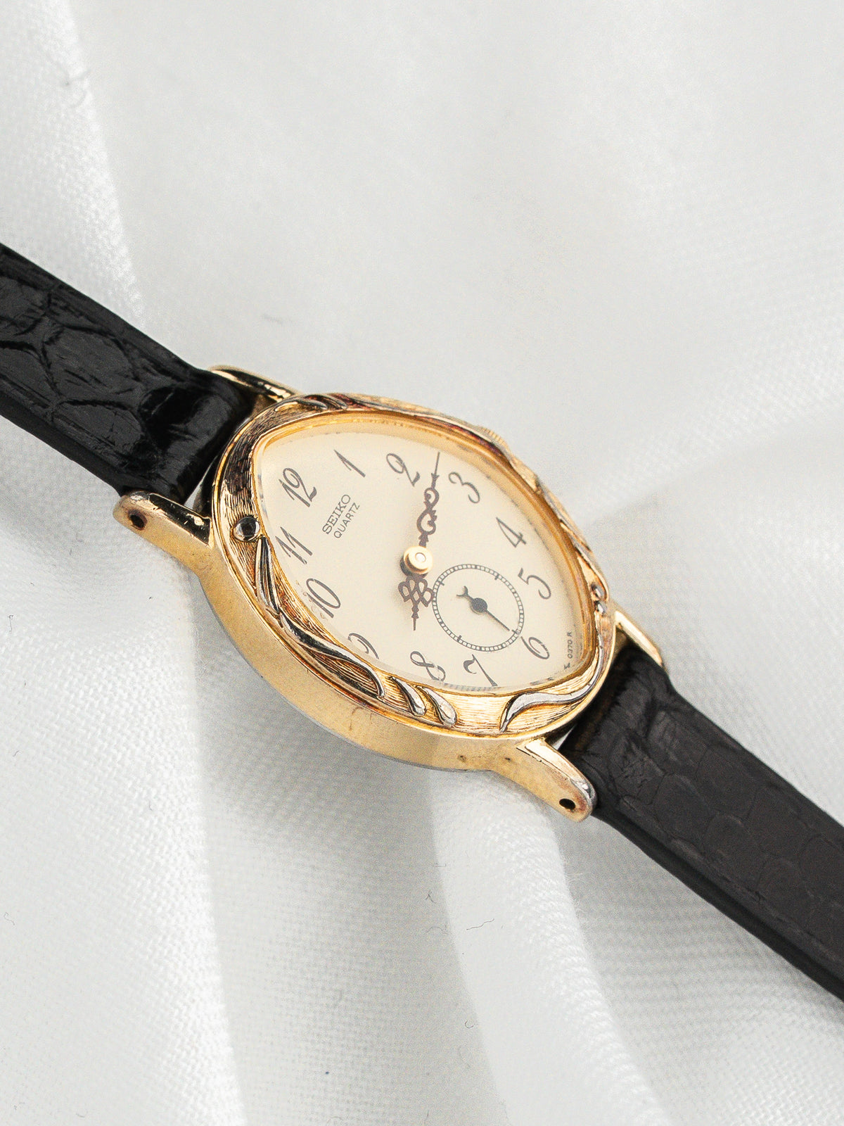 Montre Seiko Vintage 1428-5110 — Ovale, Lunette Feuillages (1983)