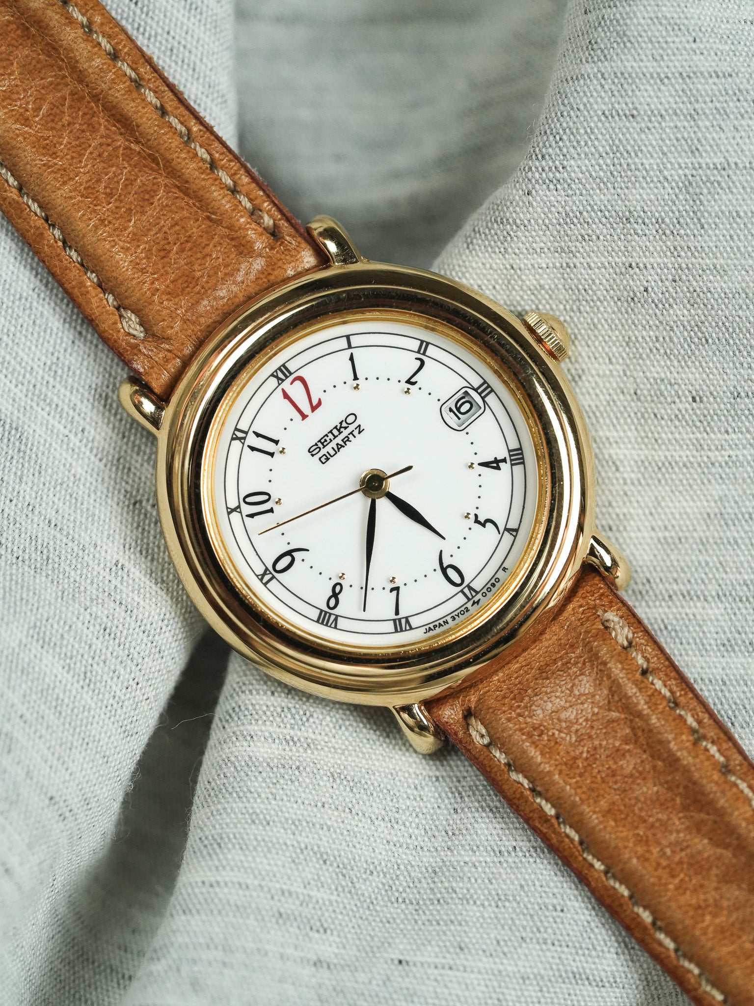 Seiko - Arabic & Roman Numerals 12h red date - NOS - 1998 