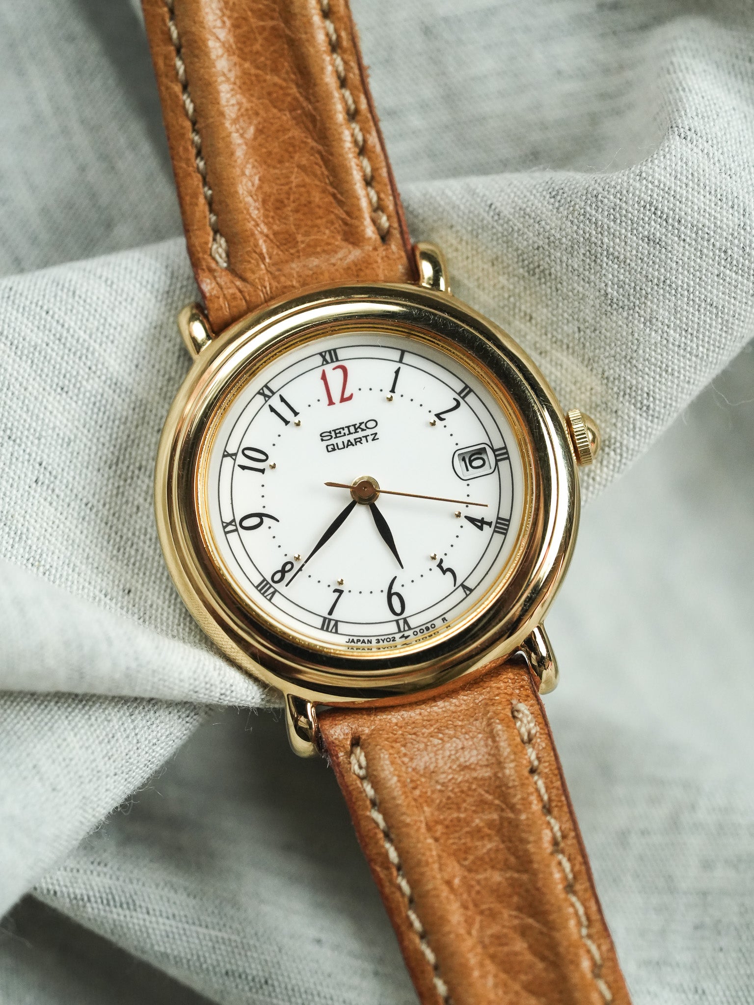 Seiko - Arabic & Roman Numerals 12h red date - NOS - 1998 
