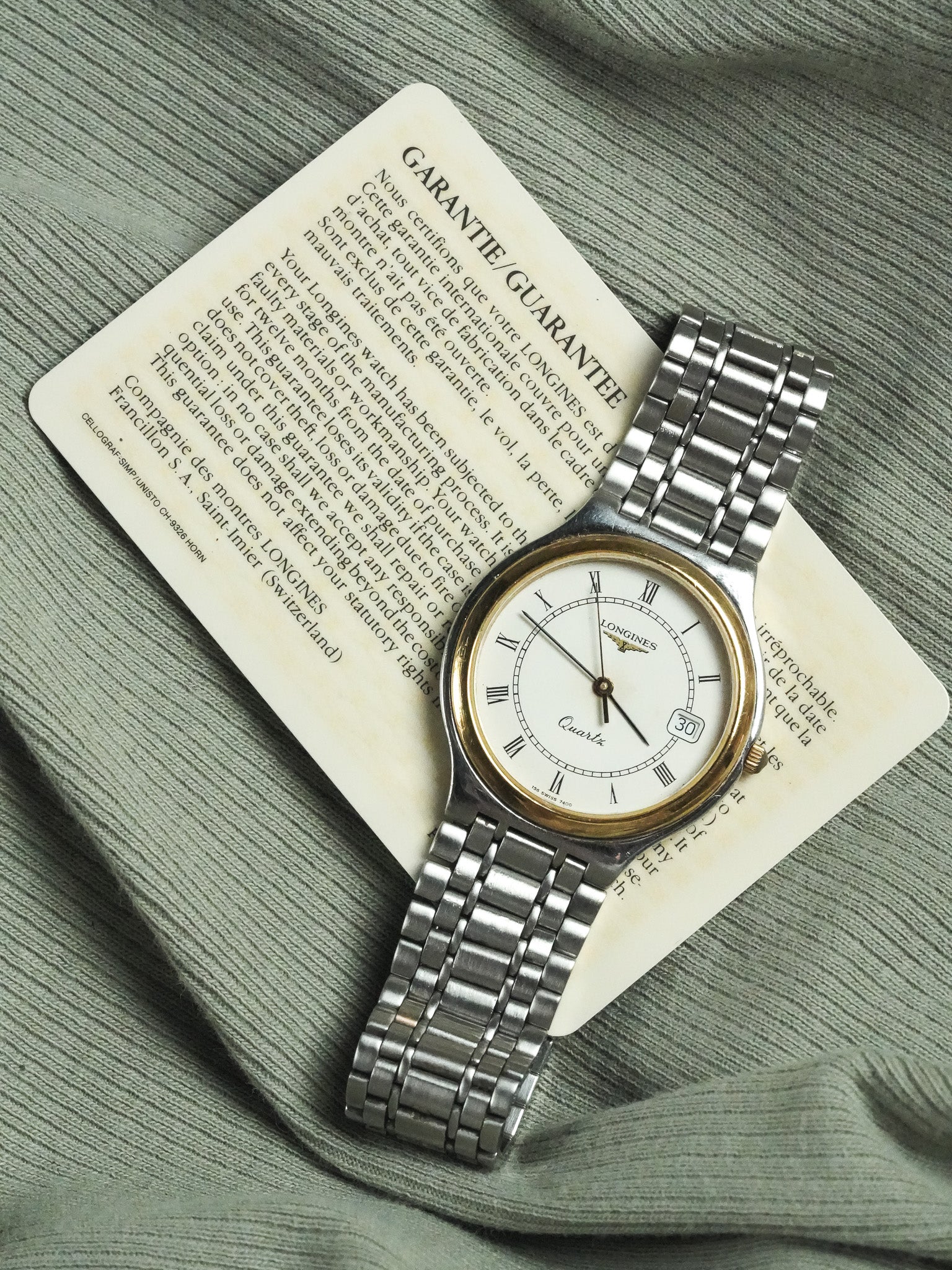 Longines - Armband aus Stahlgeflecht Lünette Gold - Papier - 1991 