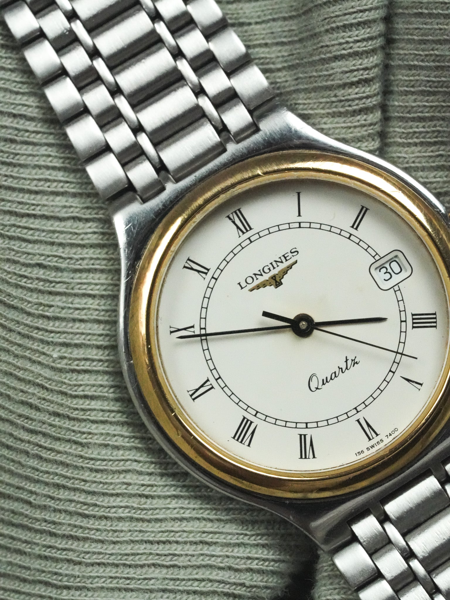 Longines - Armband aus Stahlgeflecht Lünette Gold - Papier - 1991 