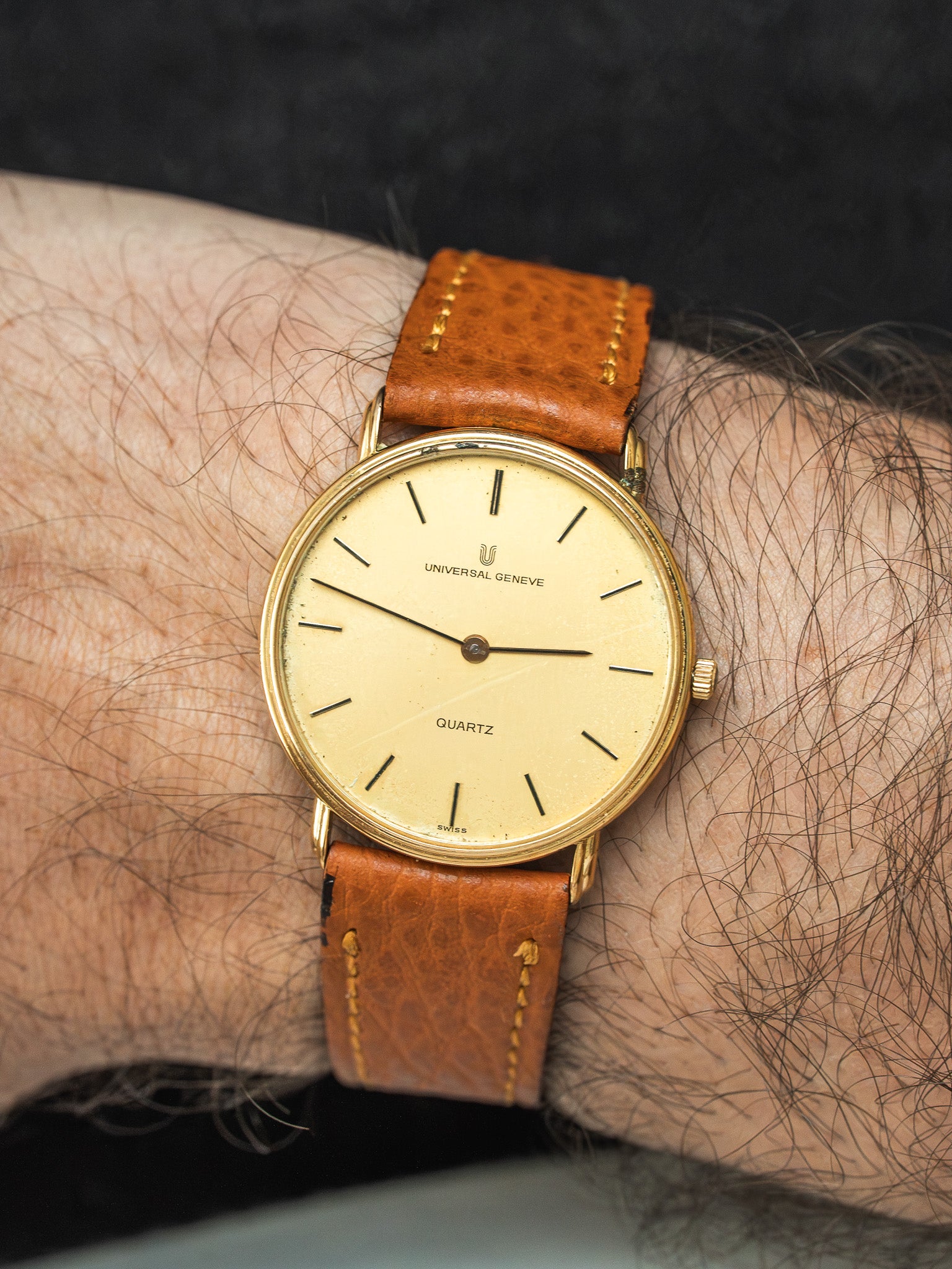 Orologio Universal Genève al quarzo placcato oro — quadrante dorato (anni 1980) 
