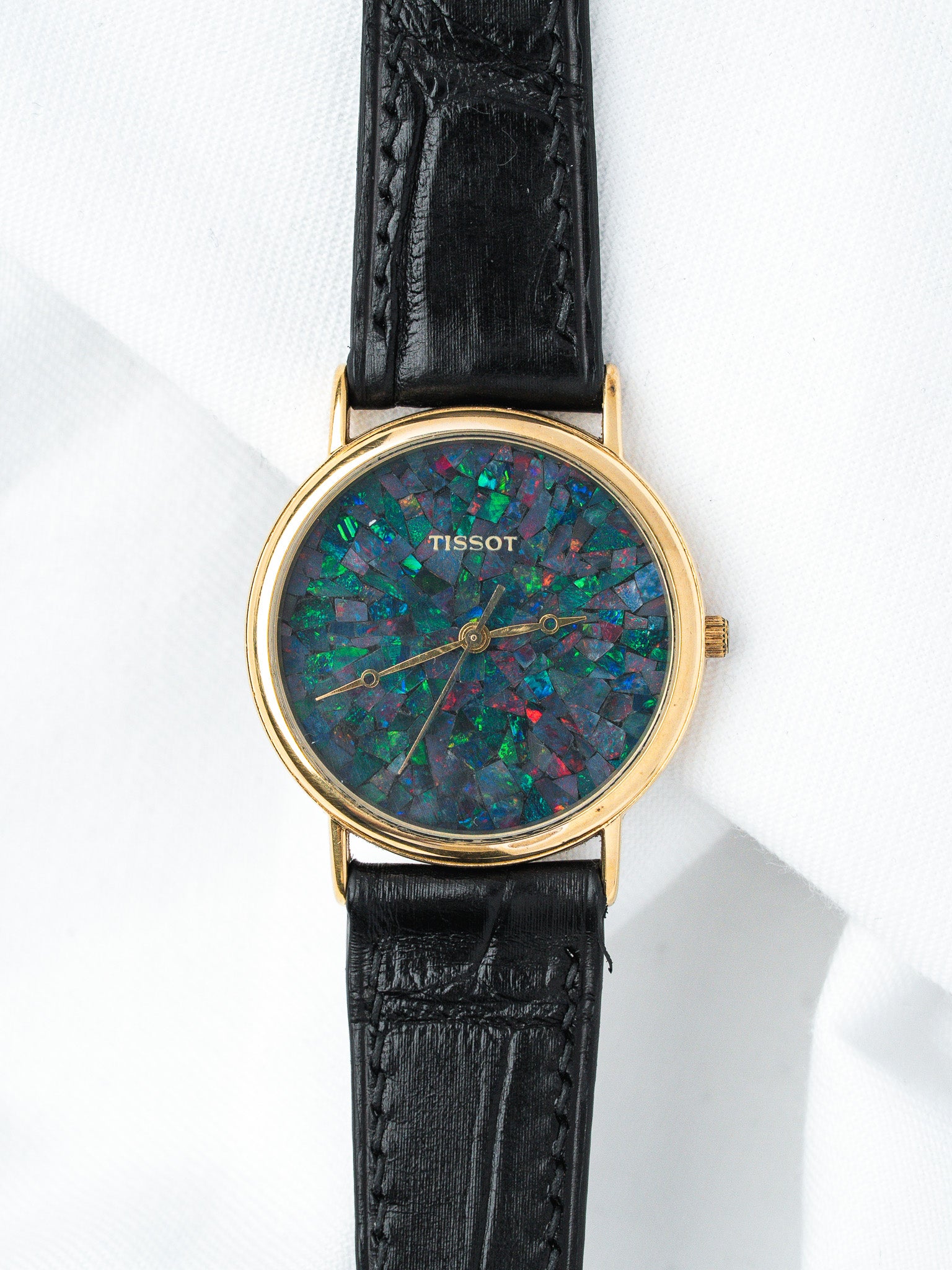 Orologio Tissot Opale — Quadrante in mosaico di opale (1980s) 