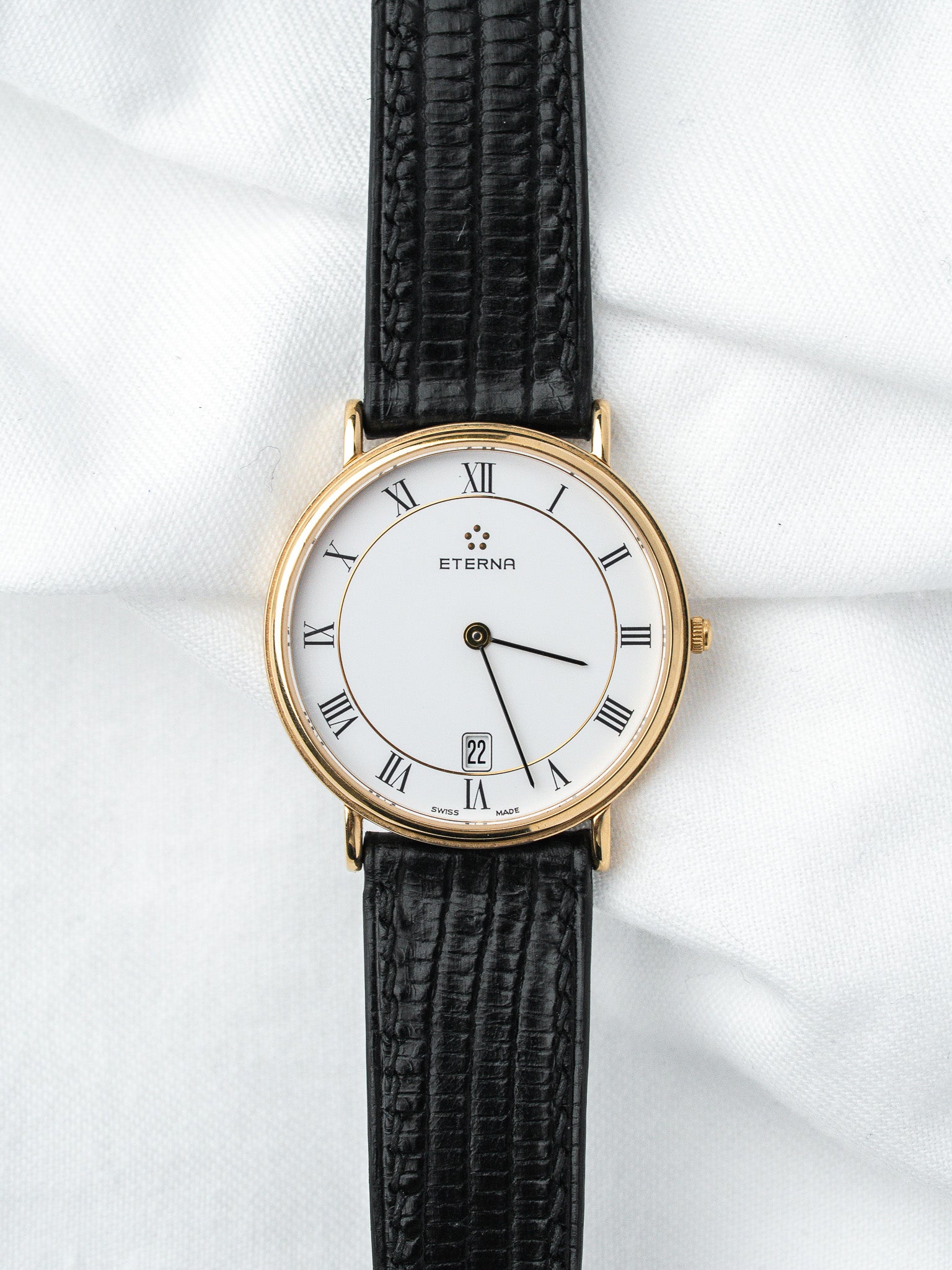 Montre Eterna Ronde Or — Cadran Blanc Chiffres Romains (1990s)