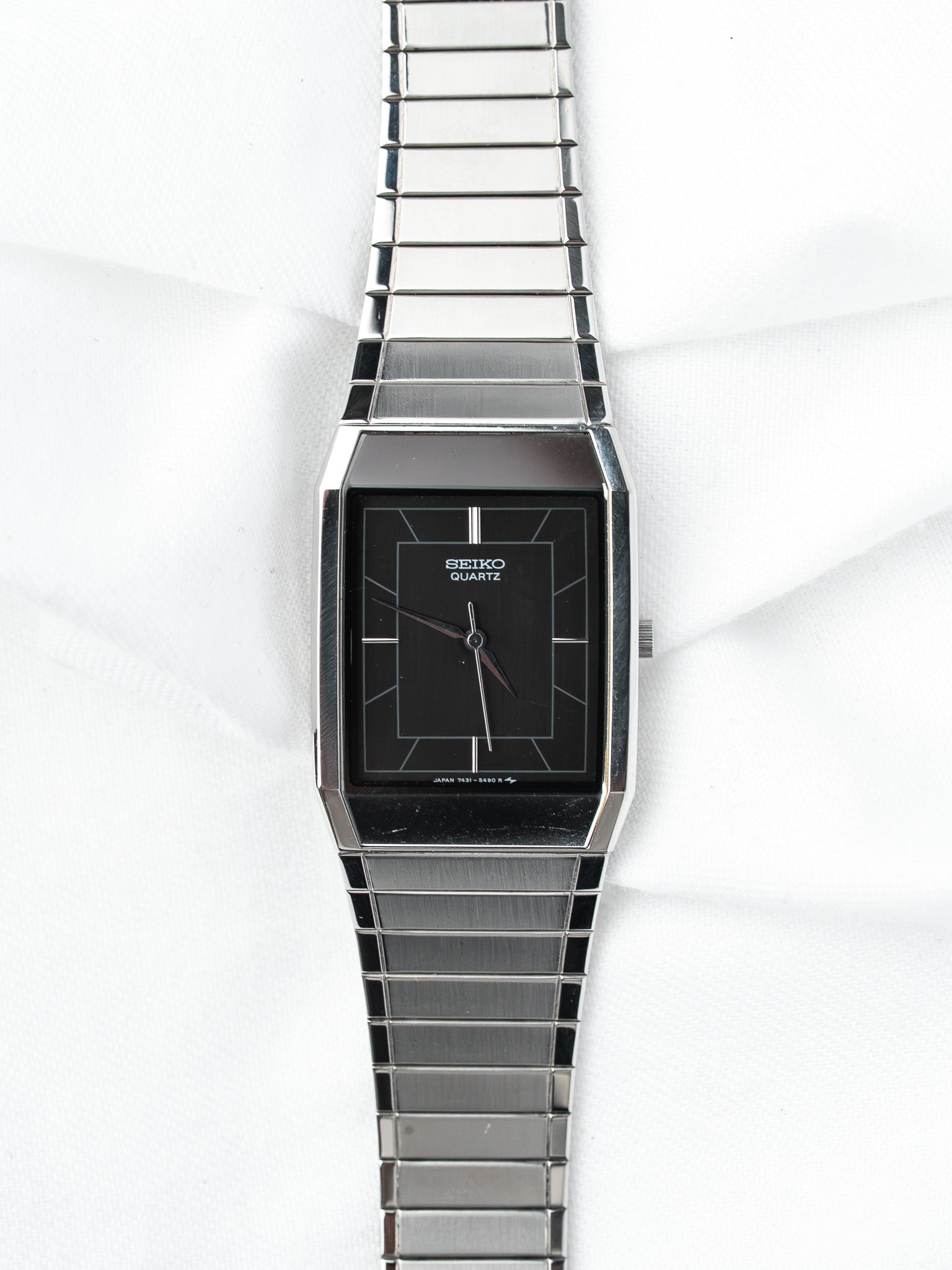 Orologio Seiko Tonneau 7431-5360 — Quadrante Nero Specchio (1985) 