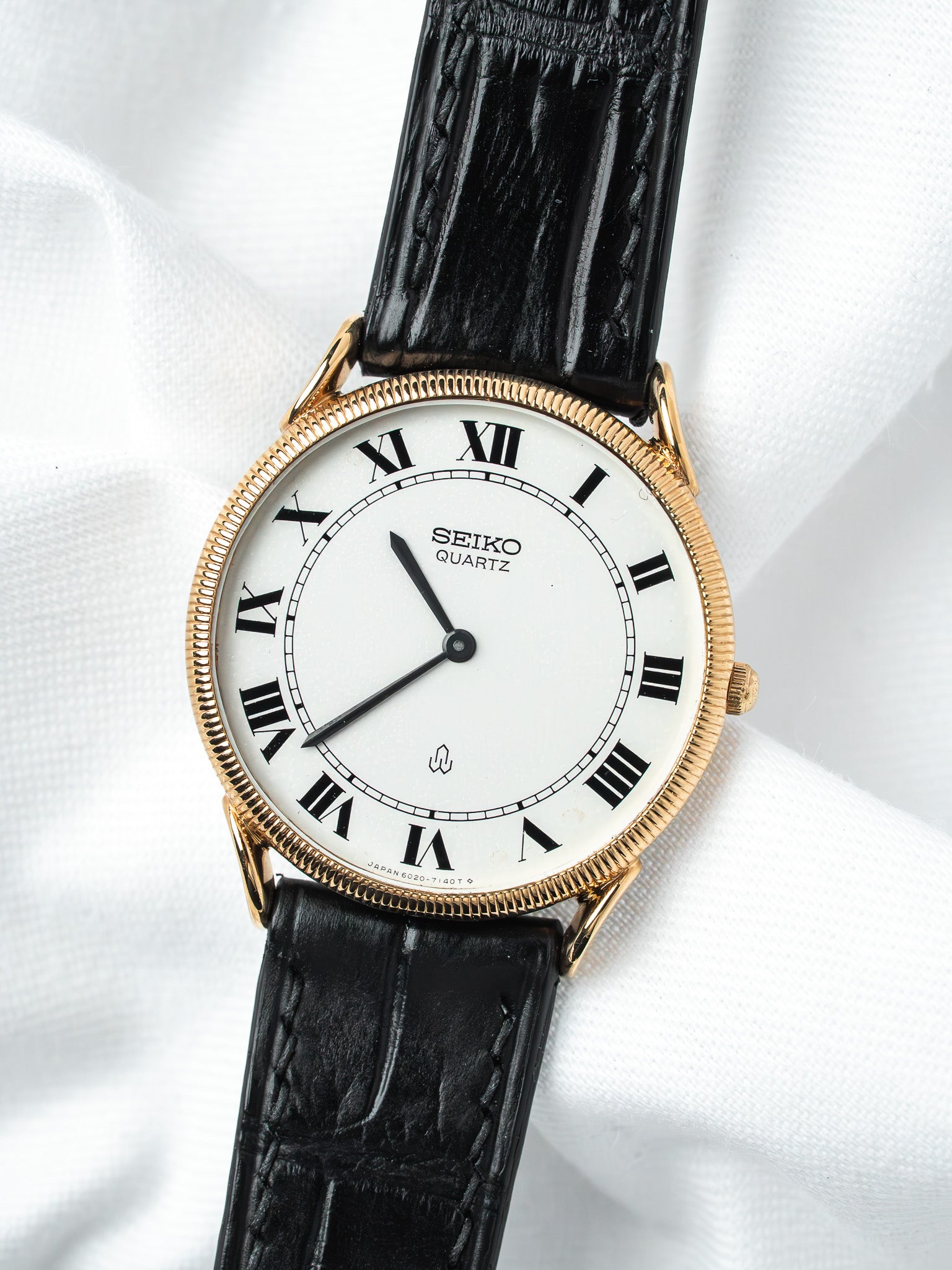 Montre Seiko 8020-7080 Plaqué Or — Cornes de Vache Guillochée (1983)