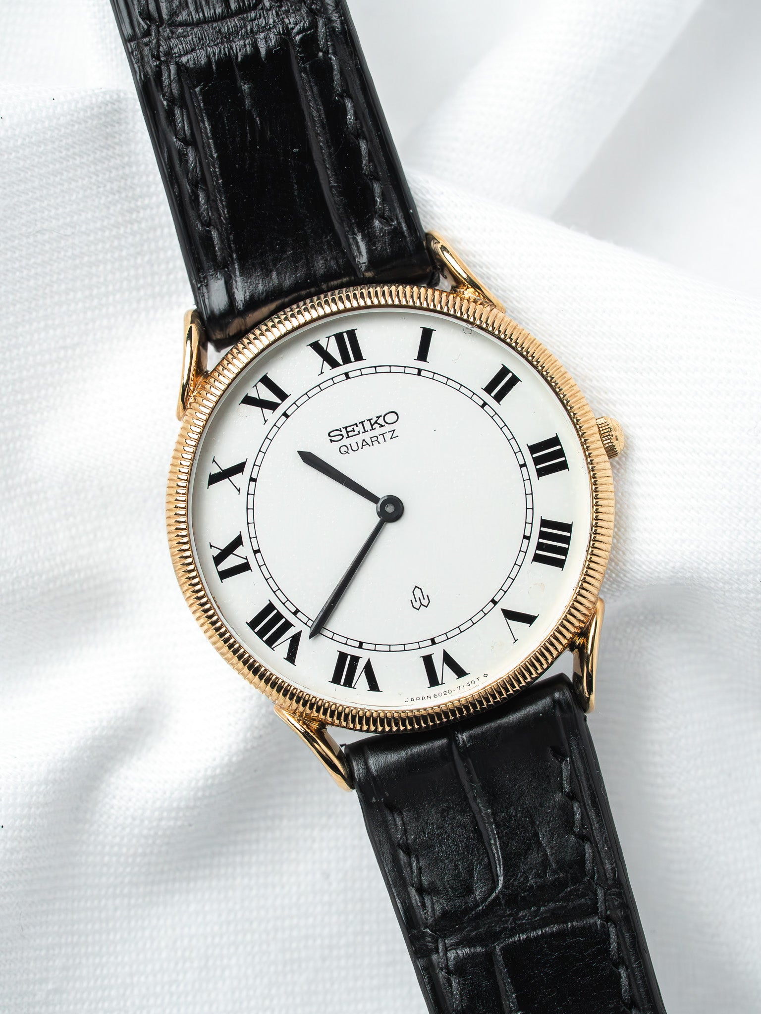 Montre Seiko 8020-7080 Plaqué Or — Cornes de Vache Guillochée (1983)