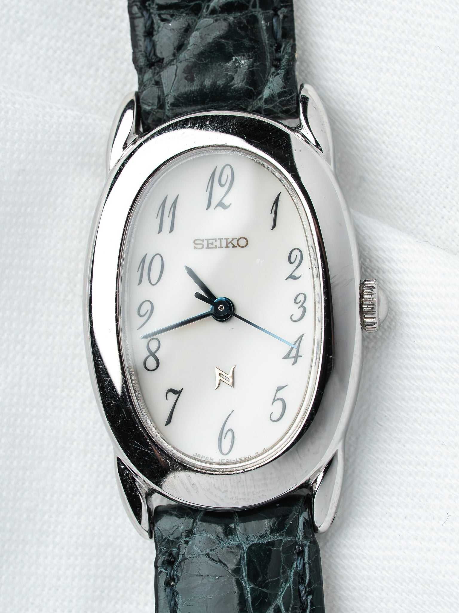 Montre Seiko Noie 1F21-5B70 Acier — Baignoire Cadran Blanc (1997)