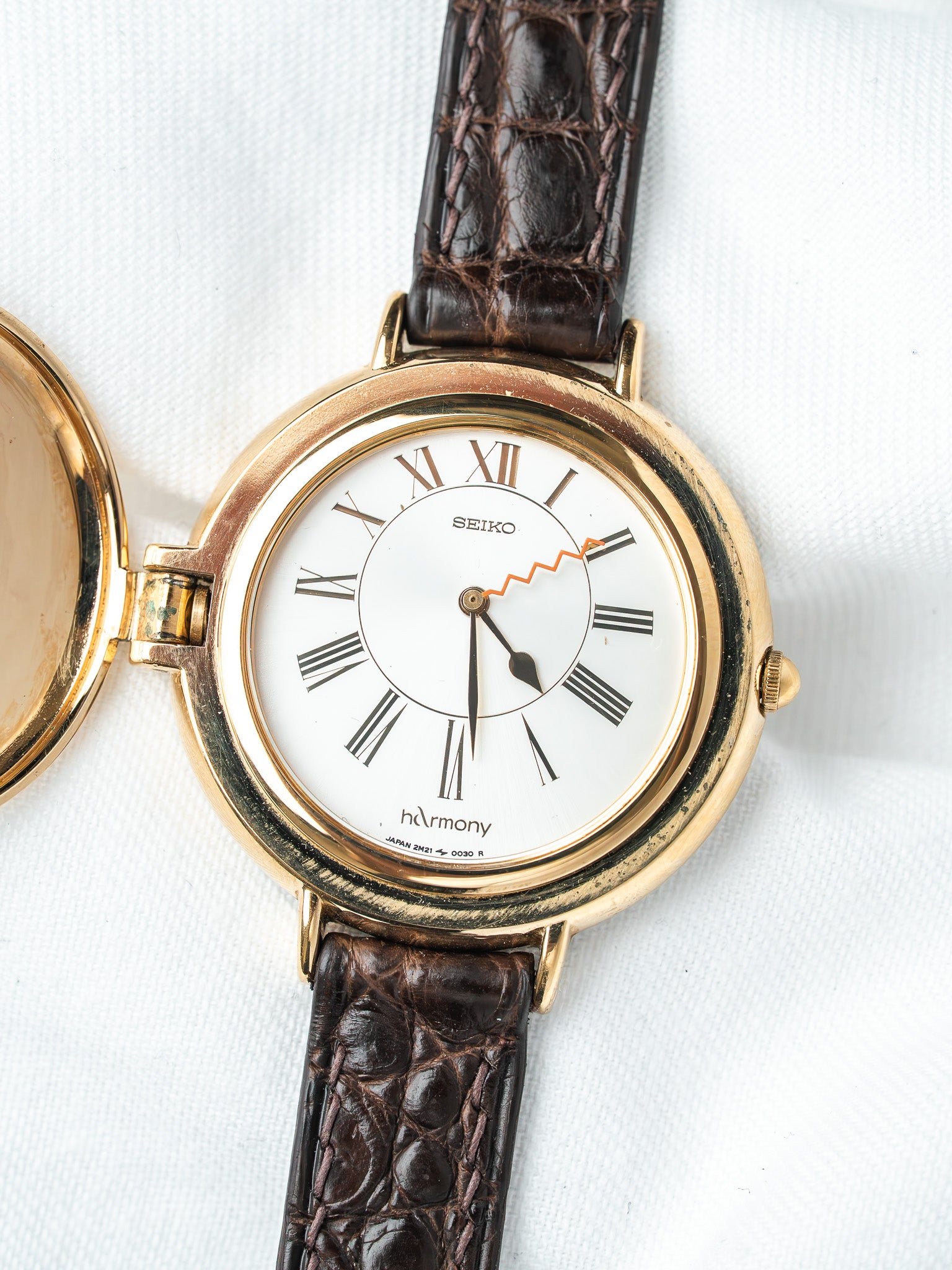 Orologio Seiko hArmony 2N21-0010 placcato oro — copertura musicale (1988) 