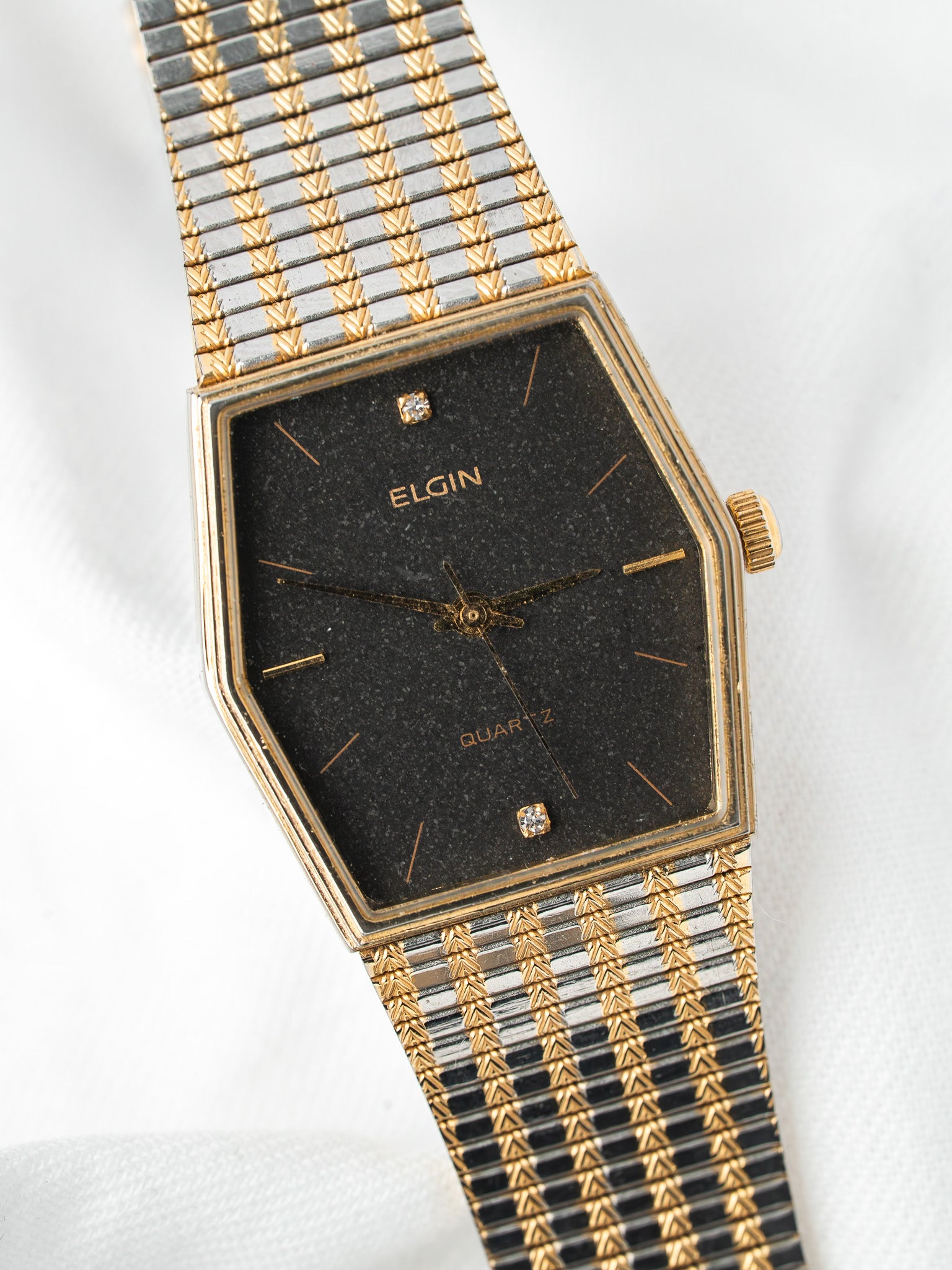 Montre Elgin Hexagonale Bicolore — Cadran Noir Pailleté (1981)
