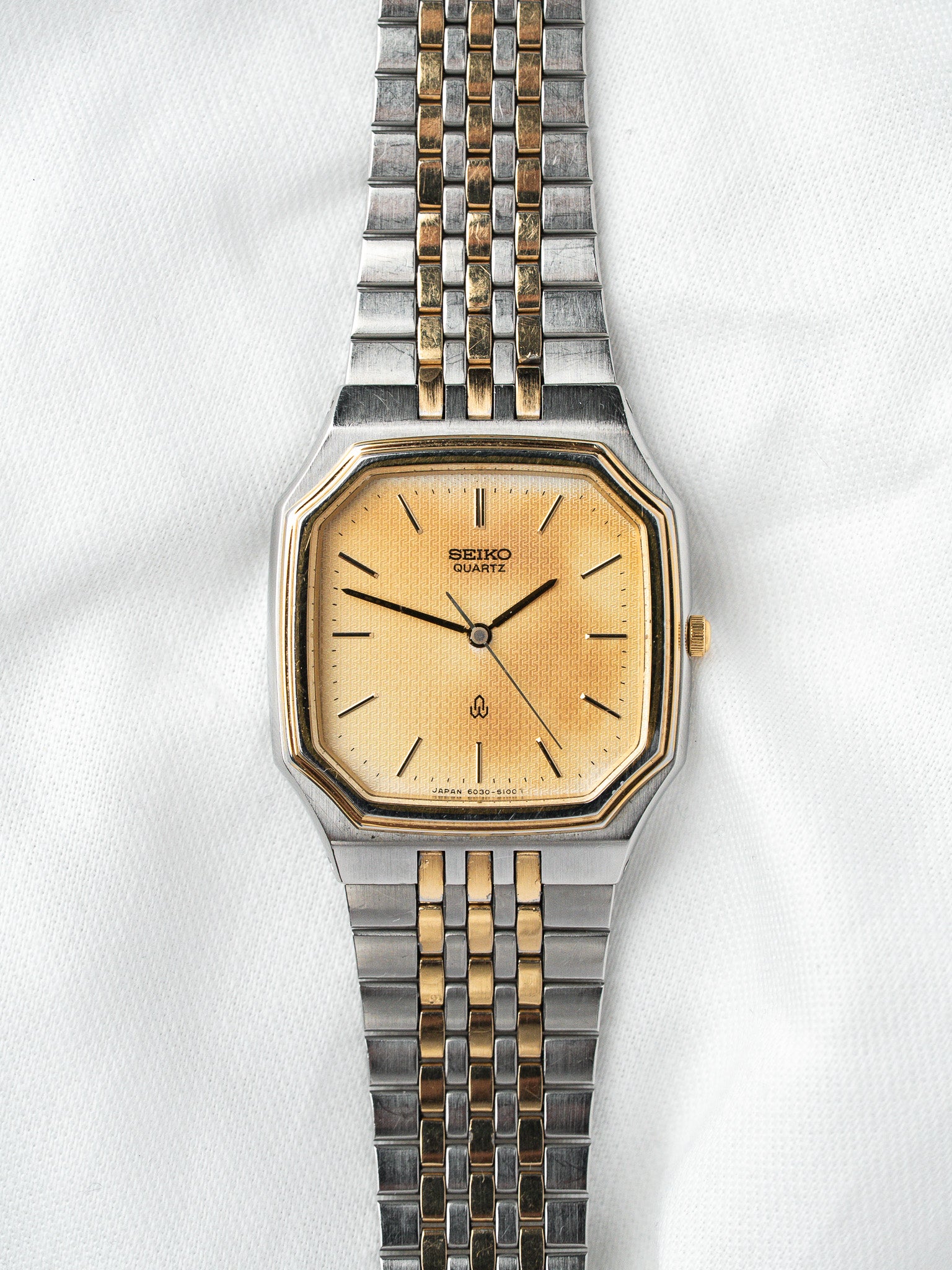 Seiko Watch Oktogonal Bicolor — Goldenes guillochiertes Zifferblatt (1988) 