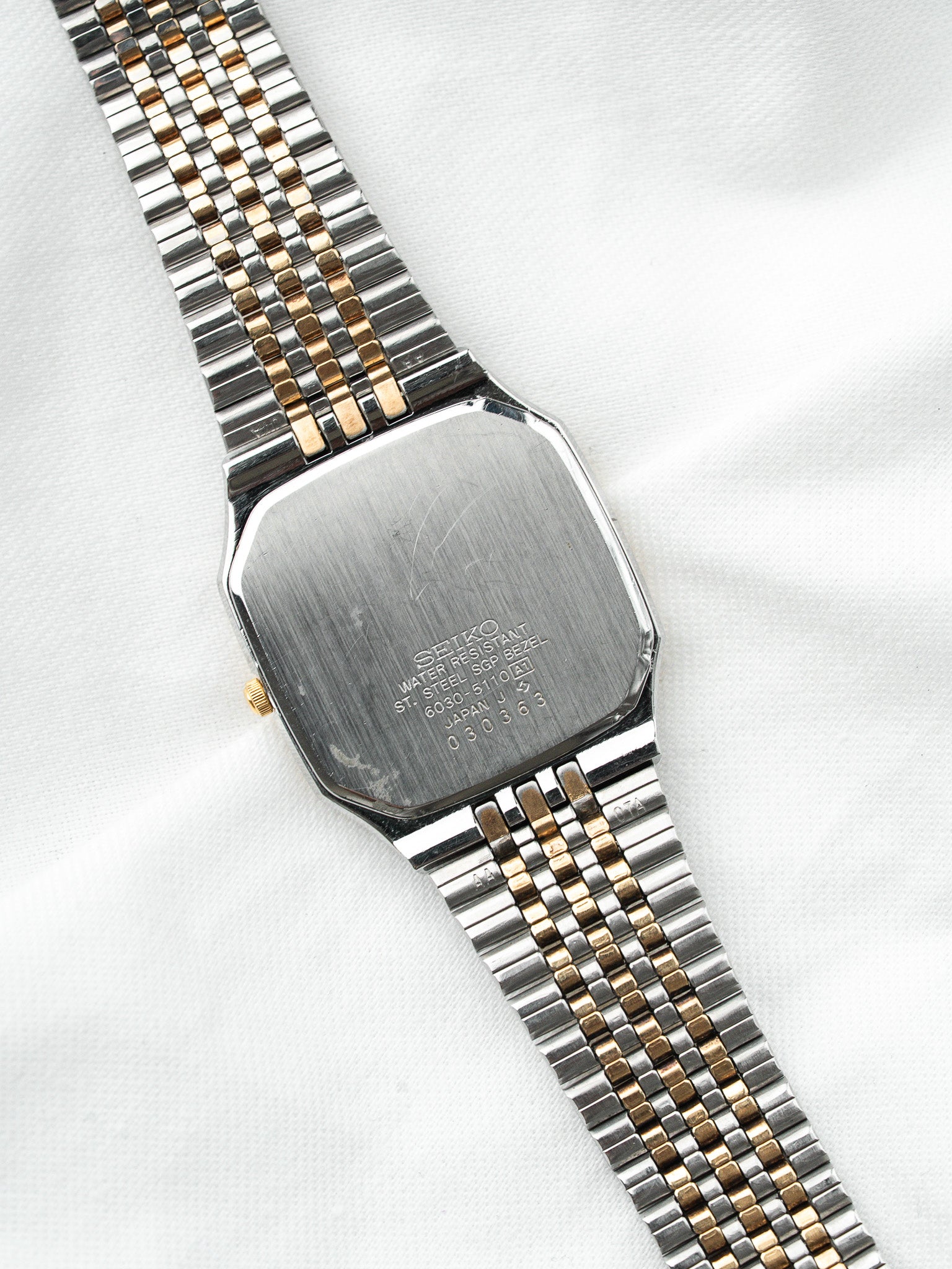 Seiko Watch Oktogonal Bicolor — Goldenes guillochiertes Zifferblatt (1988) 