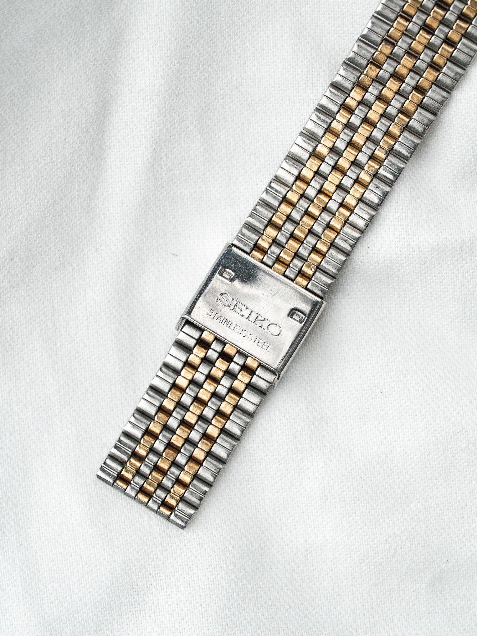Seiko Watch Oktogonal Bicolor — Goldenes guillochiertes Zifferblatt (1988) 