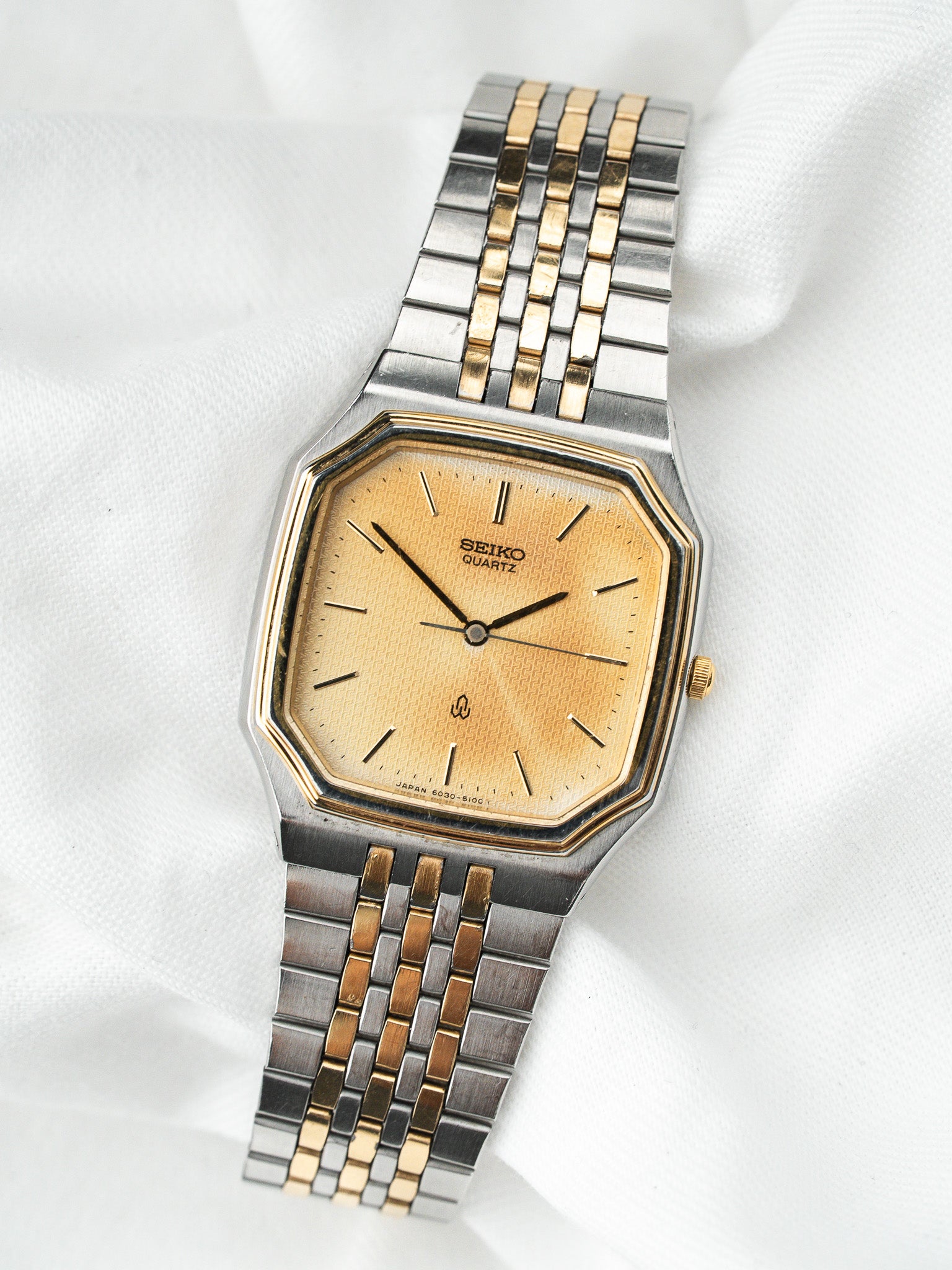 Seiko Watch Oktogonal Bicolor — Goldenes guillochiertes Zifferblatt (1988) 