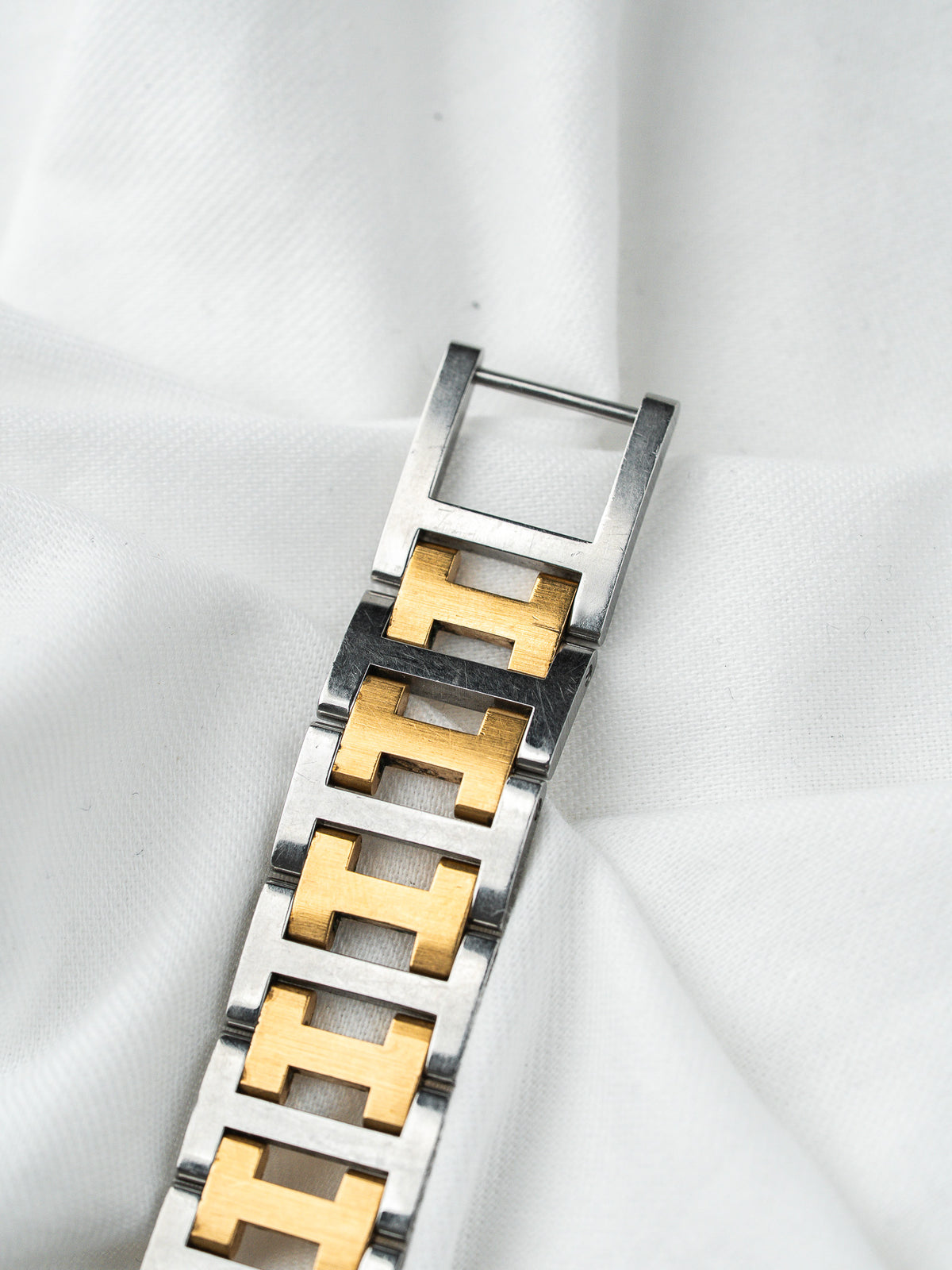 Montre Hermès Clipper 34mm Bicolore — Lunette Rivetée (1990s)