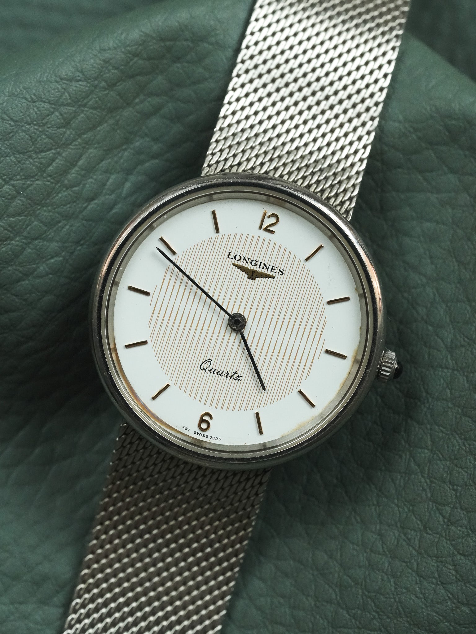 Longines - Acier en maille milanaise tapisserie or - 1980s