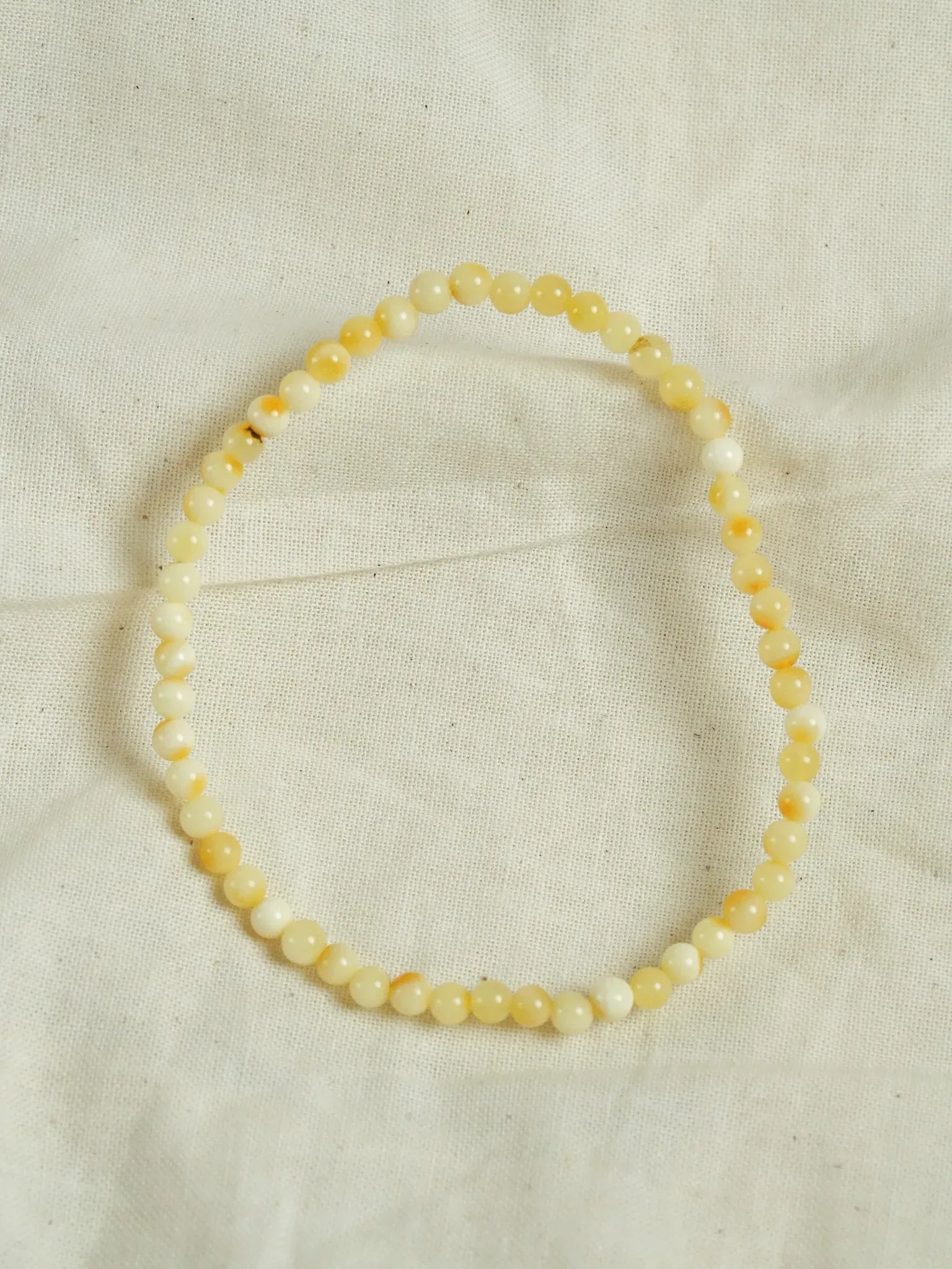 Bracelet en Ambre Baltique naturel - Rondes fines Jaune clair - Atelier Victor - Vintage  Shop