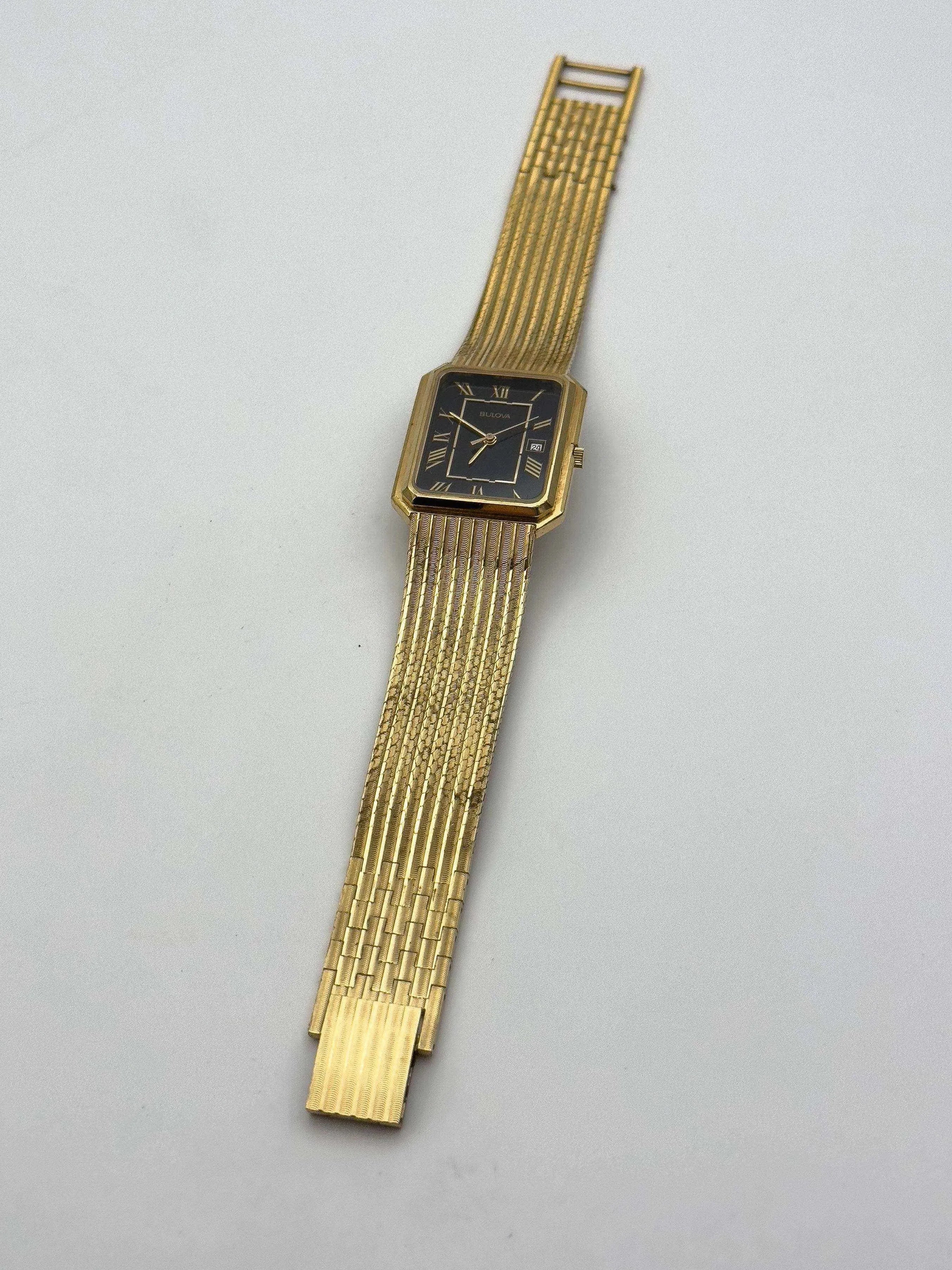 Bulova - Gold Bracelet / Black dial - 1994 - Atelier Victor Paris - Vintage Watch Shop Dubai