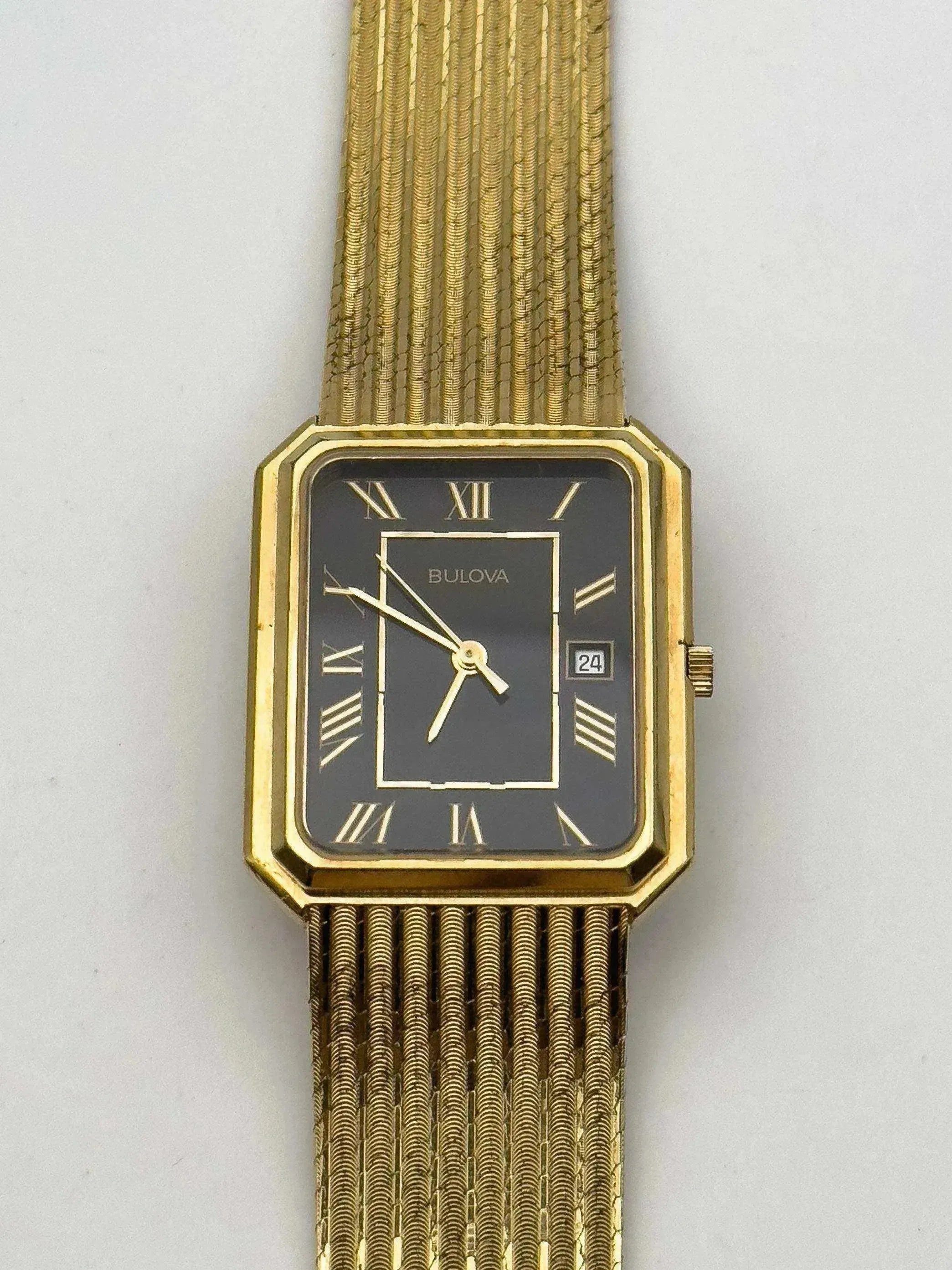 Bulova - Gold Bracelet / Black dial - 1994 - Atelier Victor - Vintage  Shop