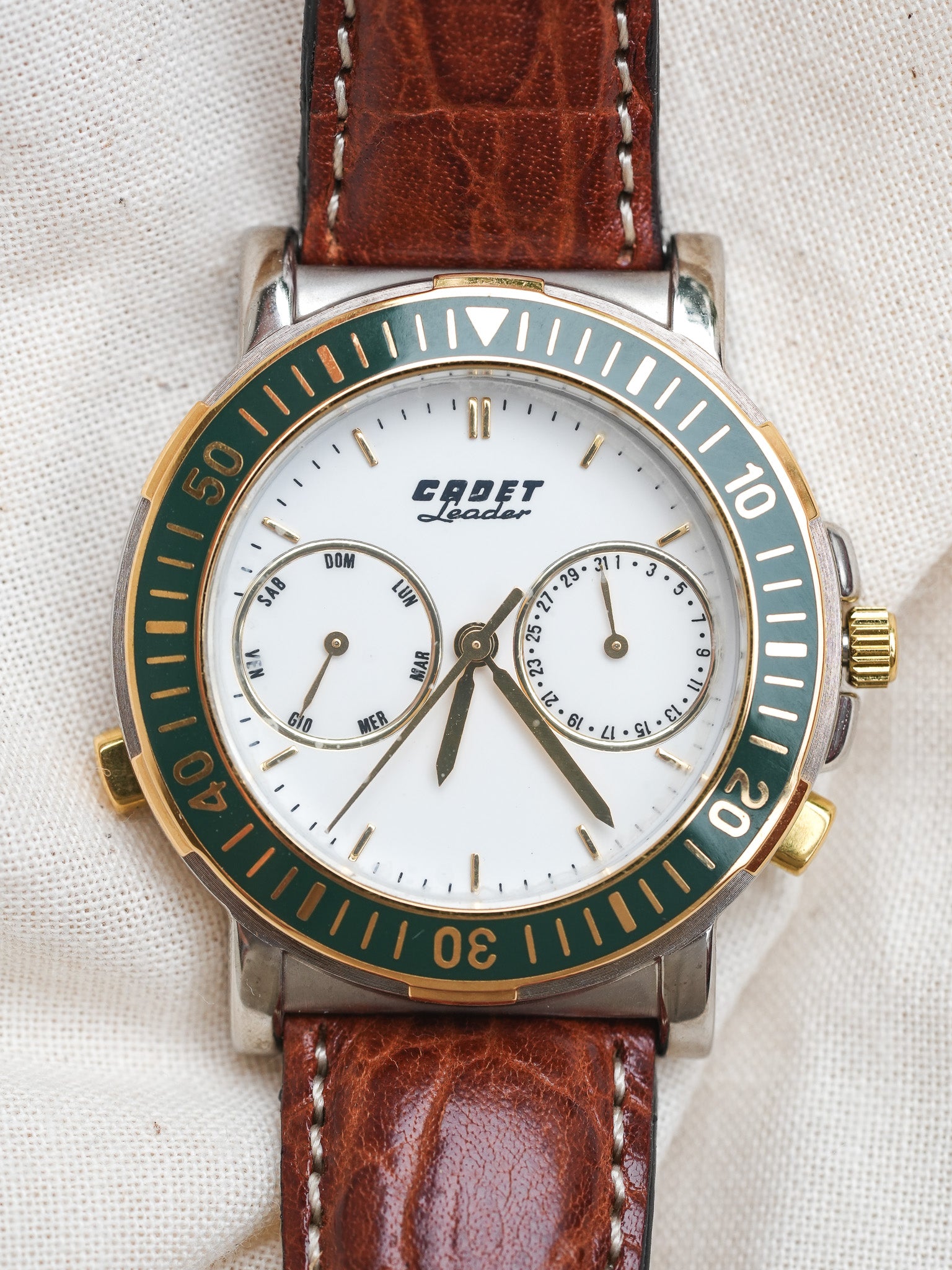 Cadet - Leader Calendrier Acier Or Lunette Verte - NOS - 1980s - Atelier Victor Paris - Vintage Watch Shop Dubai