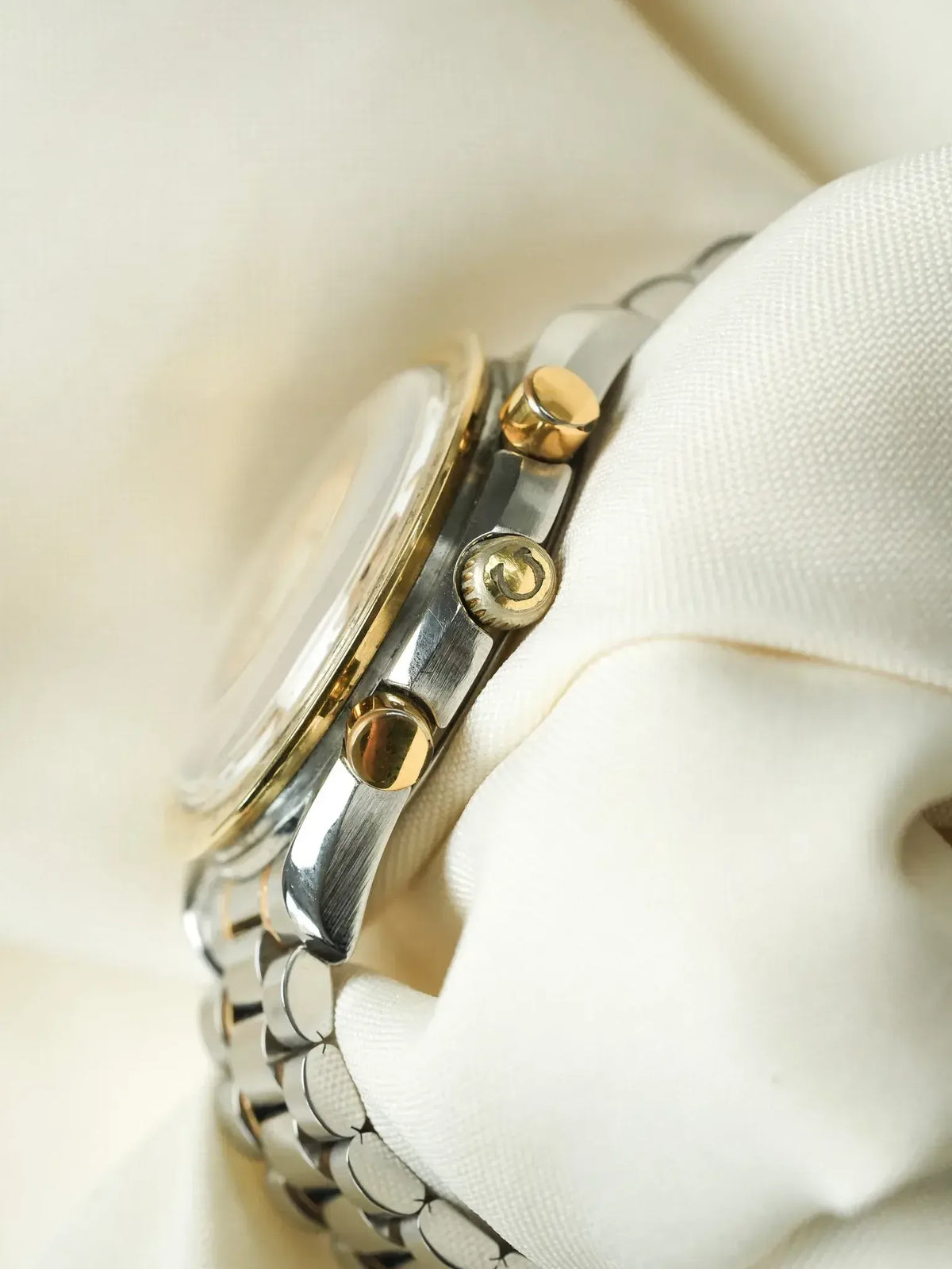 Rolex vintage chronograph with two-tone steel and gold case, bracelet detail